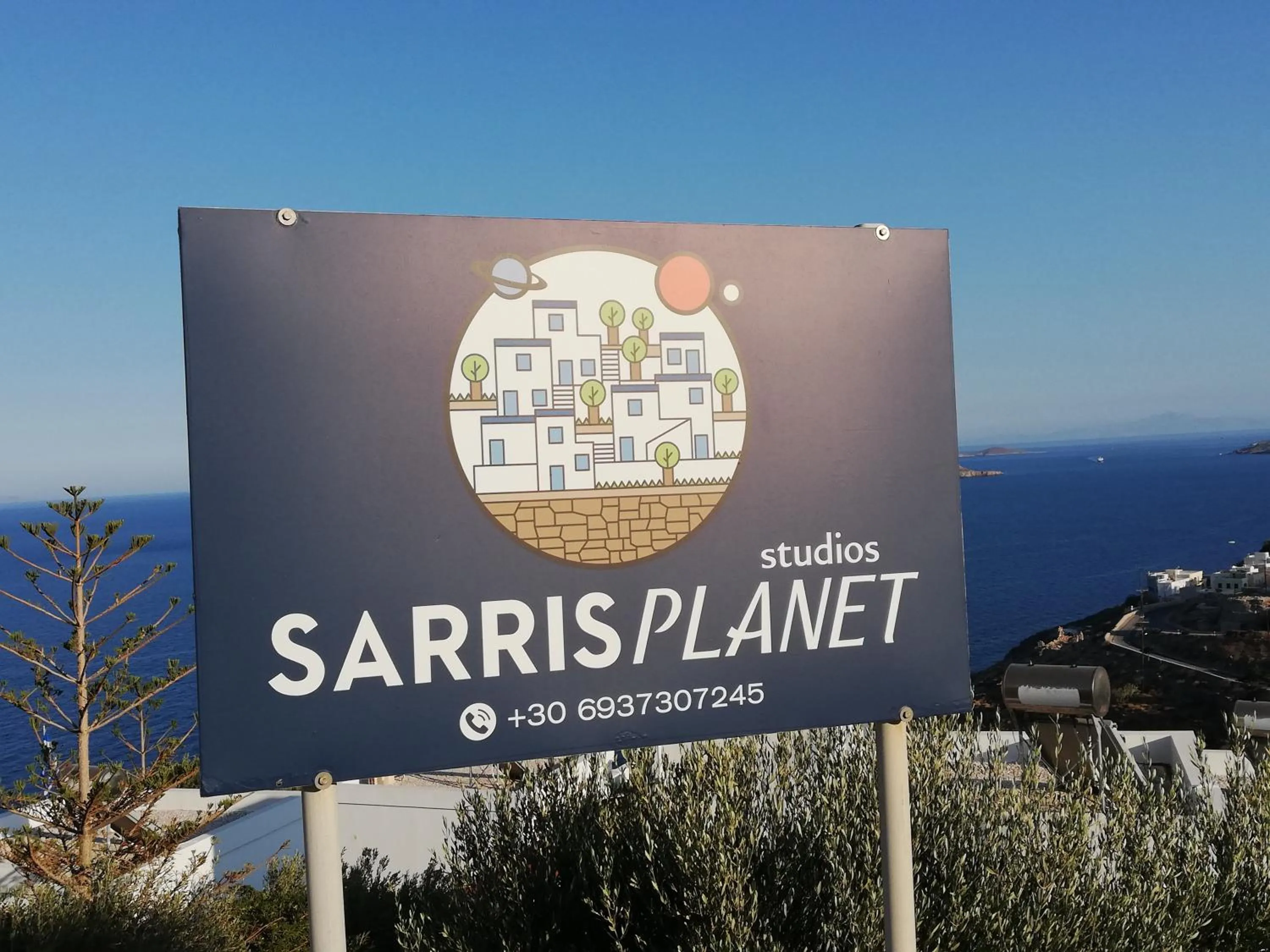 Property logo or sign in Sarris Planet