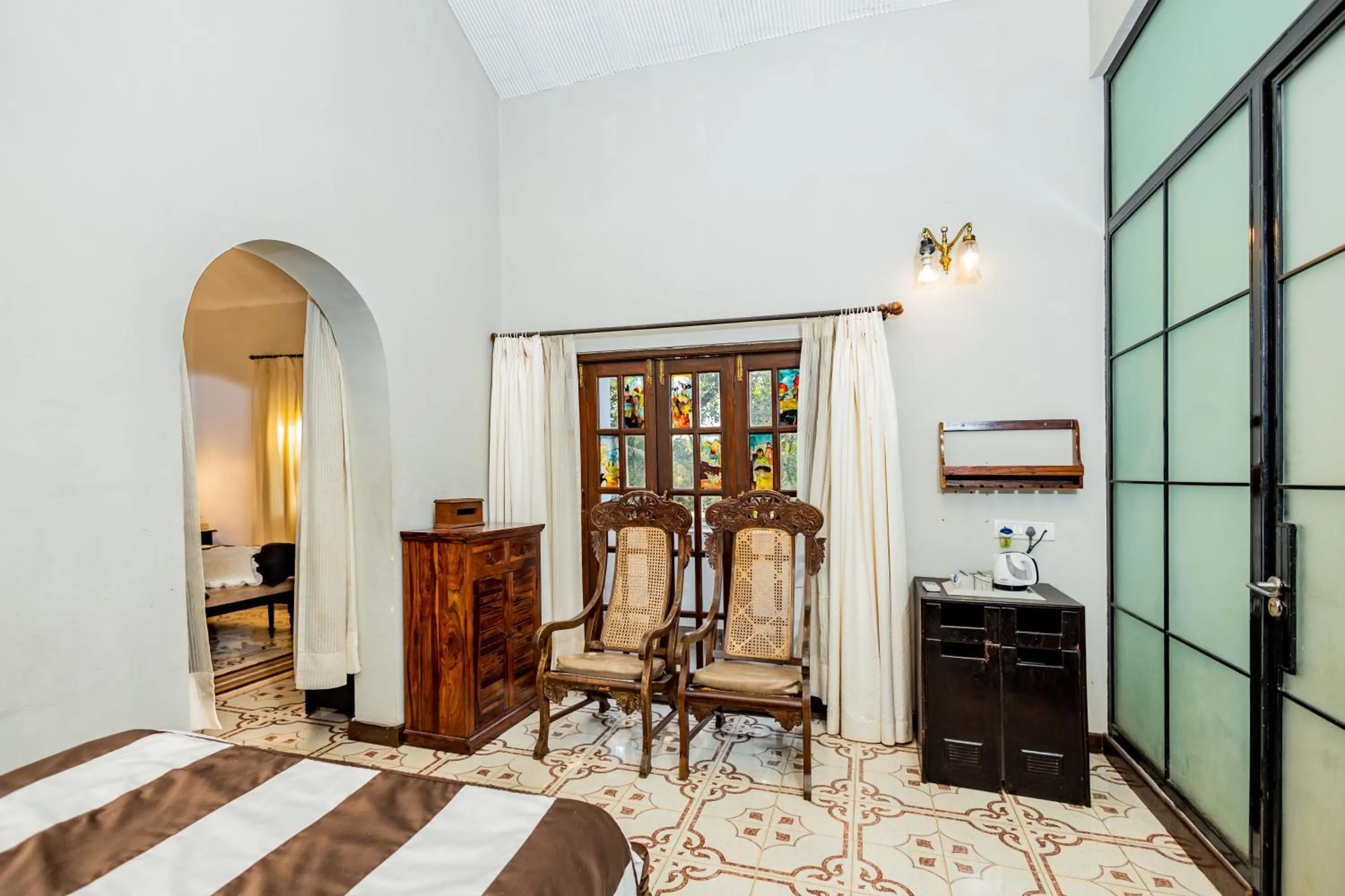 Living room, Bed in The Tamarind Hotel - A Boutique Heritage Stay, Anjuna - Goa