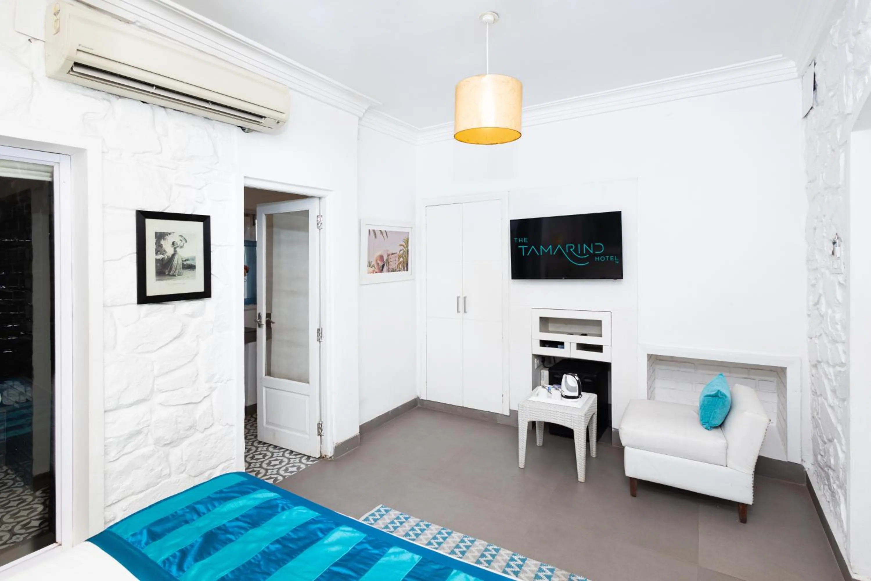 TV and multimedia, Bed in The Tamarind Hotel - A Boutique Heritage Stay, Anjuna - Goa