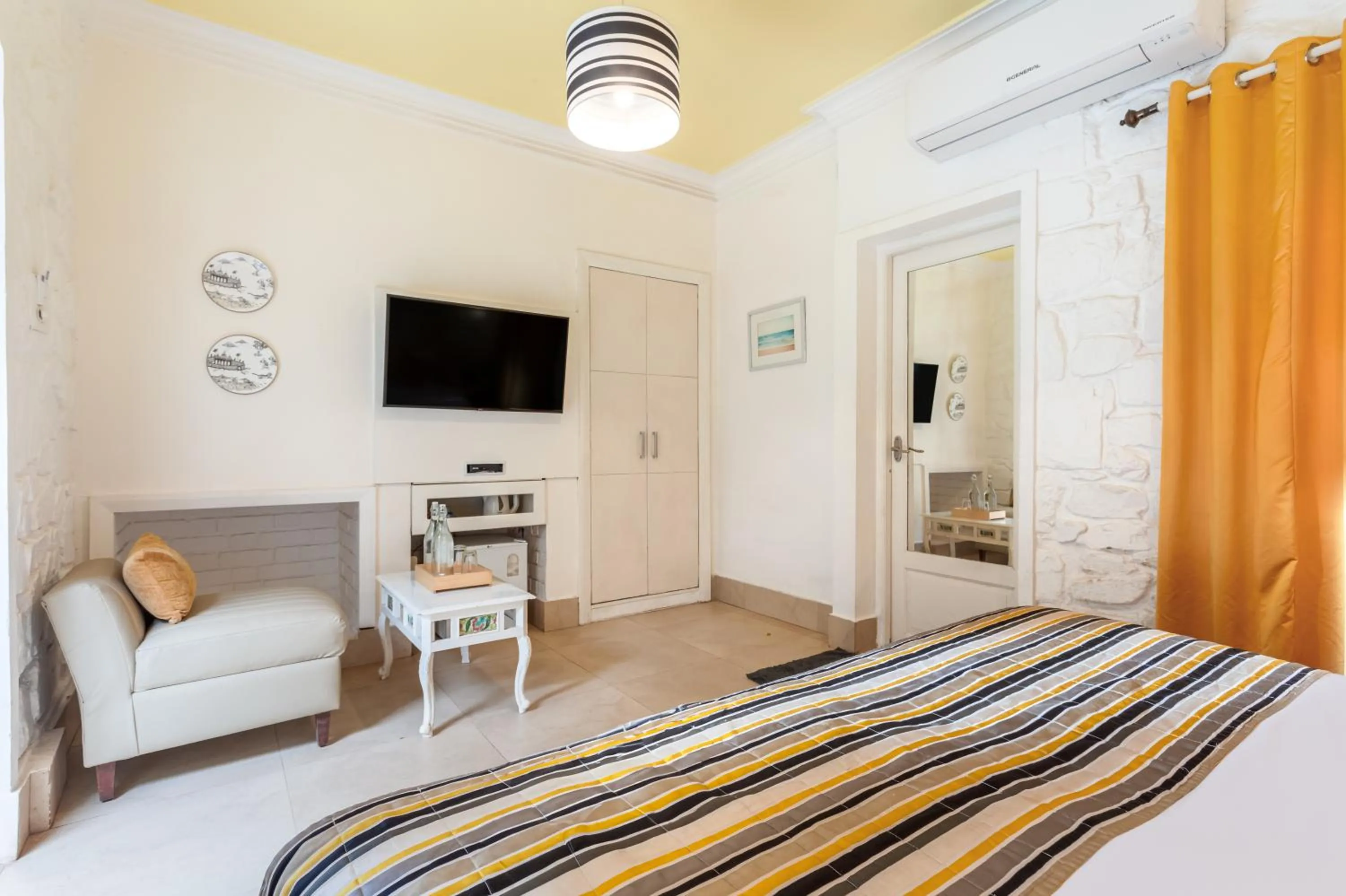 Photo of the whole room, Bed in The Tamarind Hotel - A Boutique Heritage Stay, Anjuna - Goa