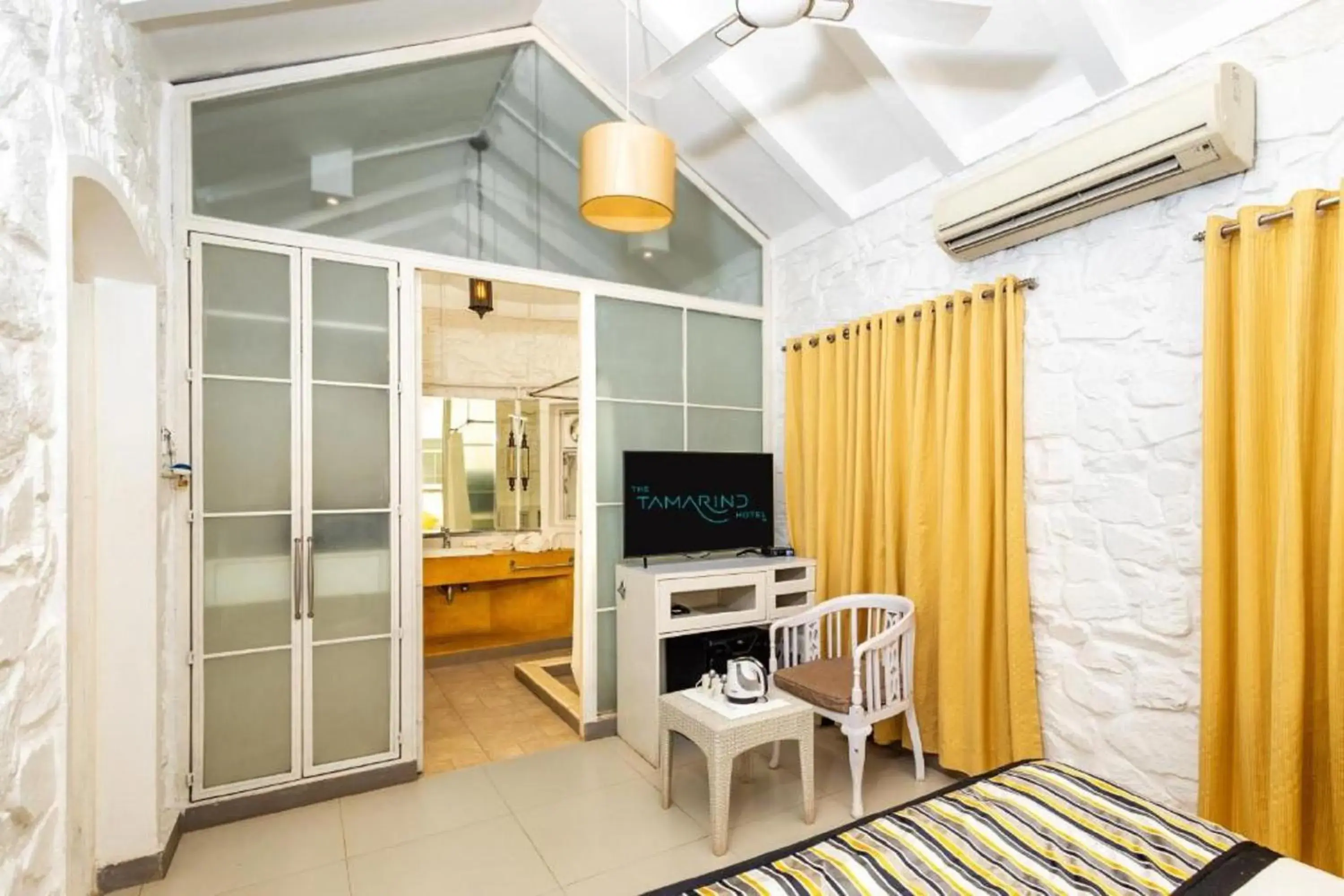 Deluxe Room with Pool View in The Tamarind Hotel - A Boutique Heritage Stay, Anjuna - Goa Deluxe Room with Pool View in The Tamarind Hotel - A Boutique Heritage Stay, Anjuna - Goa