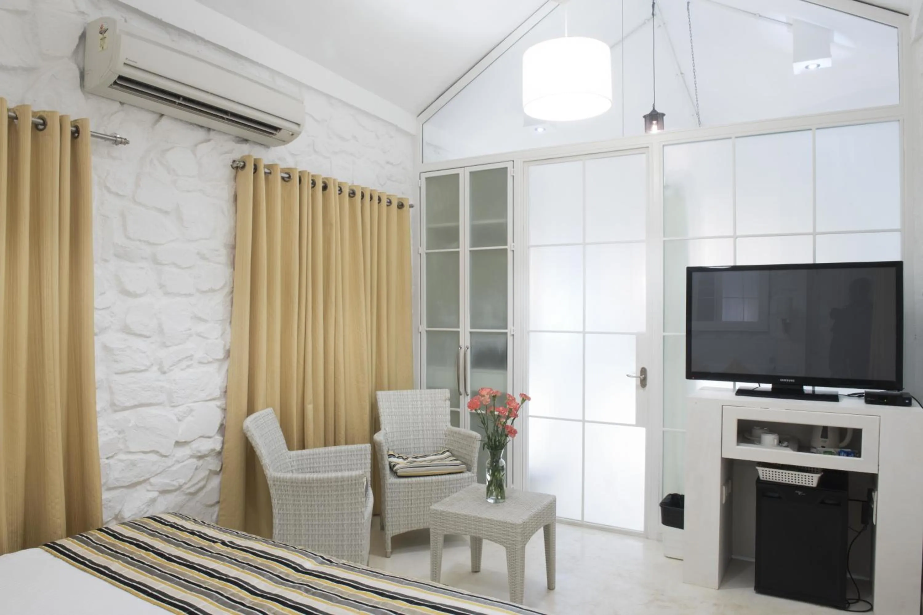 TV and multimedia in The Tamarind Hotel - A Boutique Heritage Stay, Anjuna - Goa