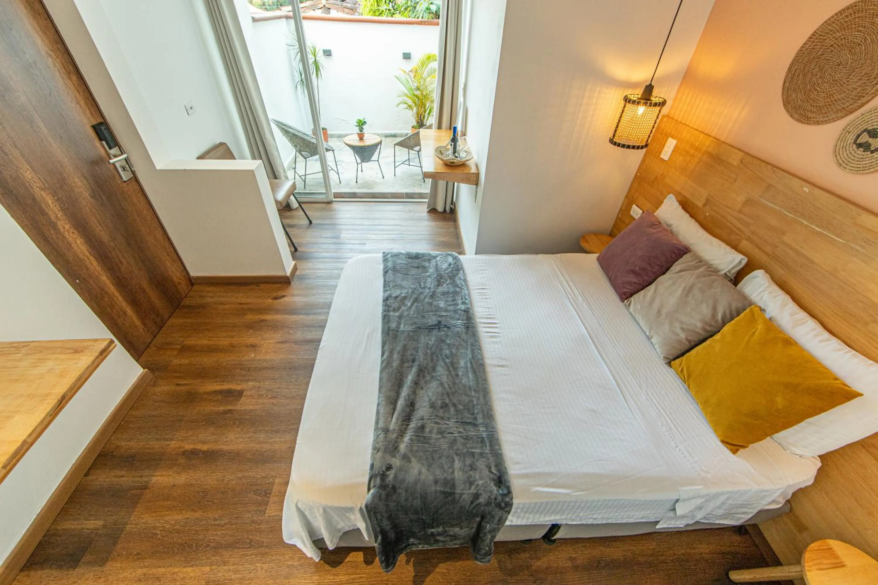 Balcony/Terrace, Bed in La Martina Boutique Hotel