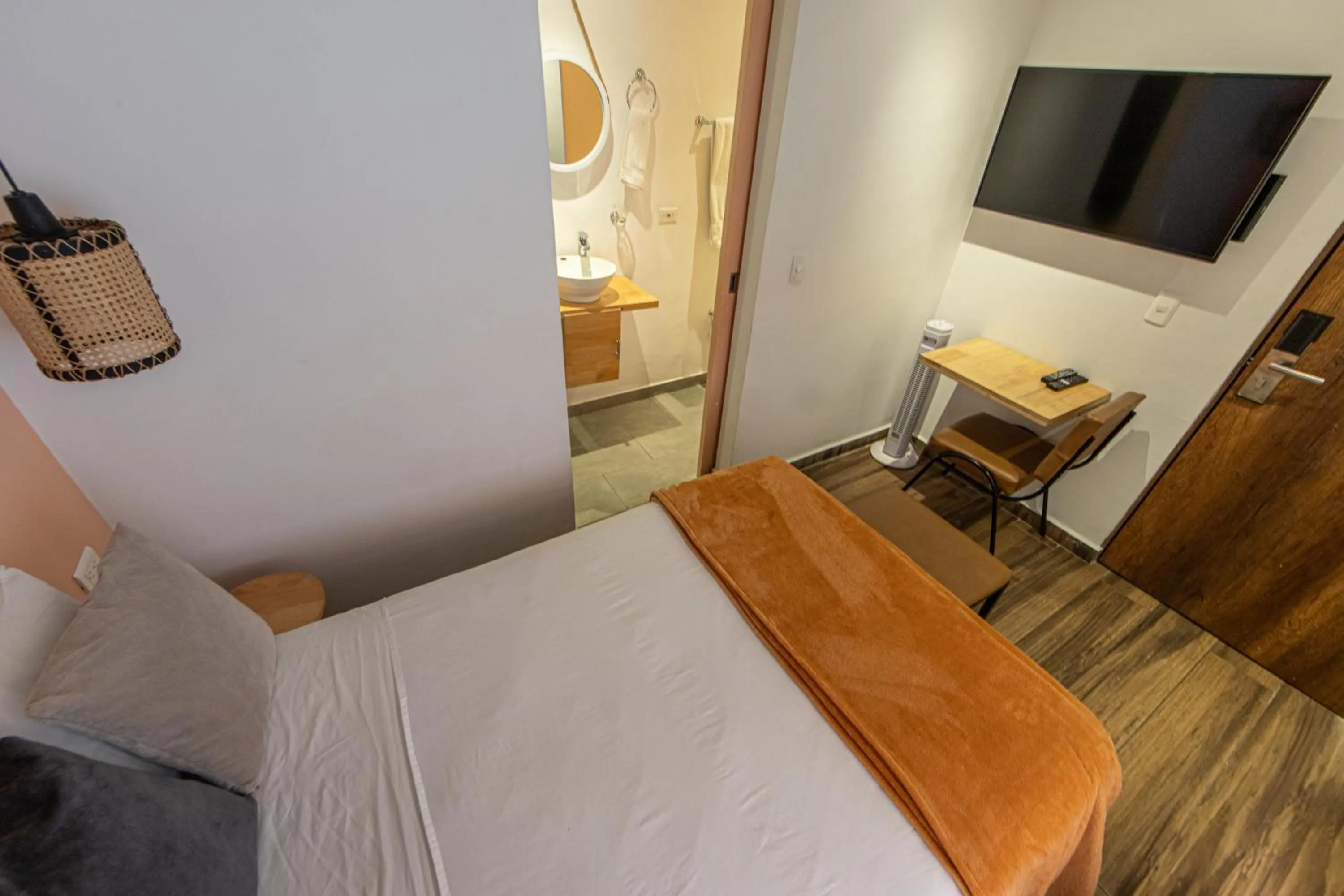 Bed in La Martina Boutique Hotel