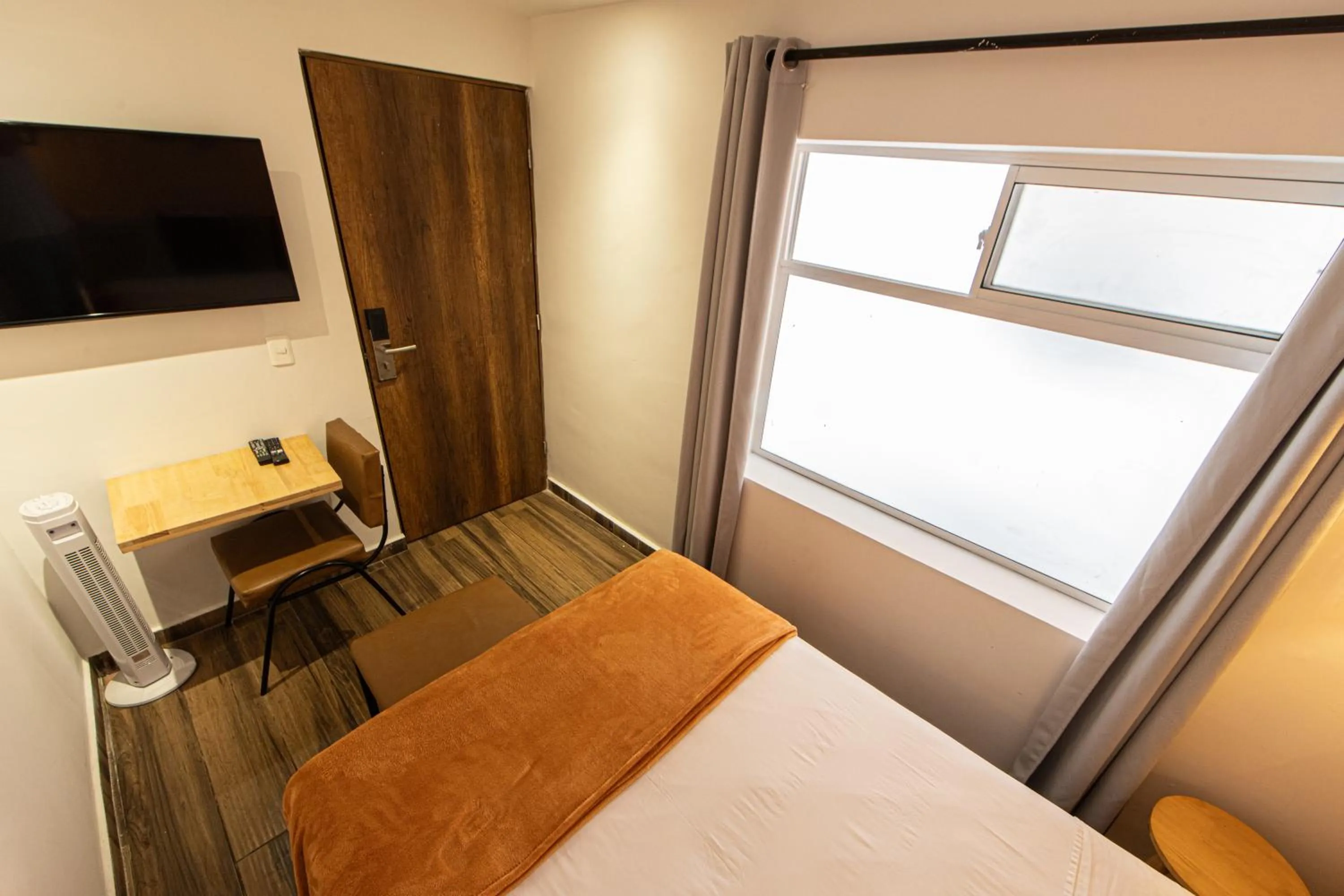 Bed in La Martina Boutique Hotel