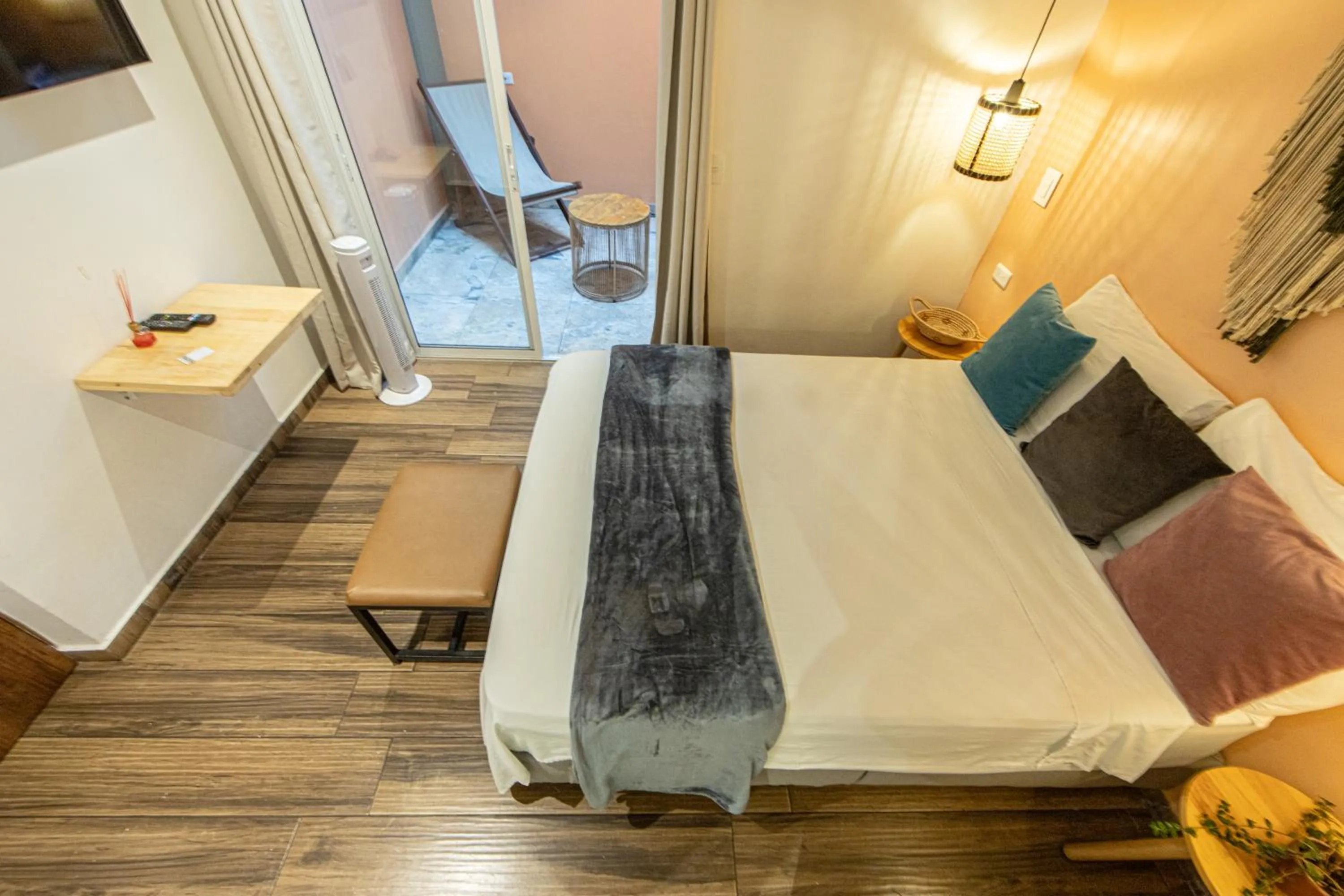 Bed in La Martina Boutique Hotel