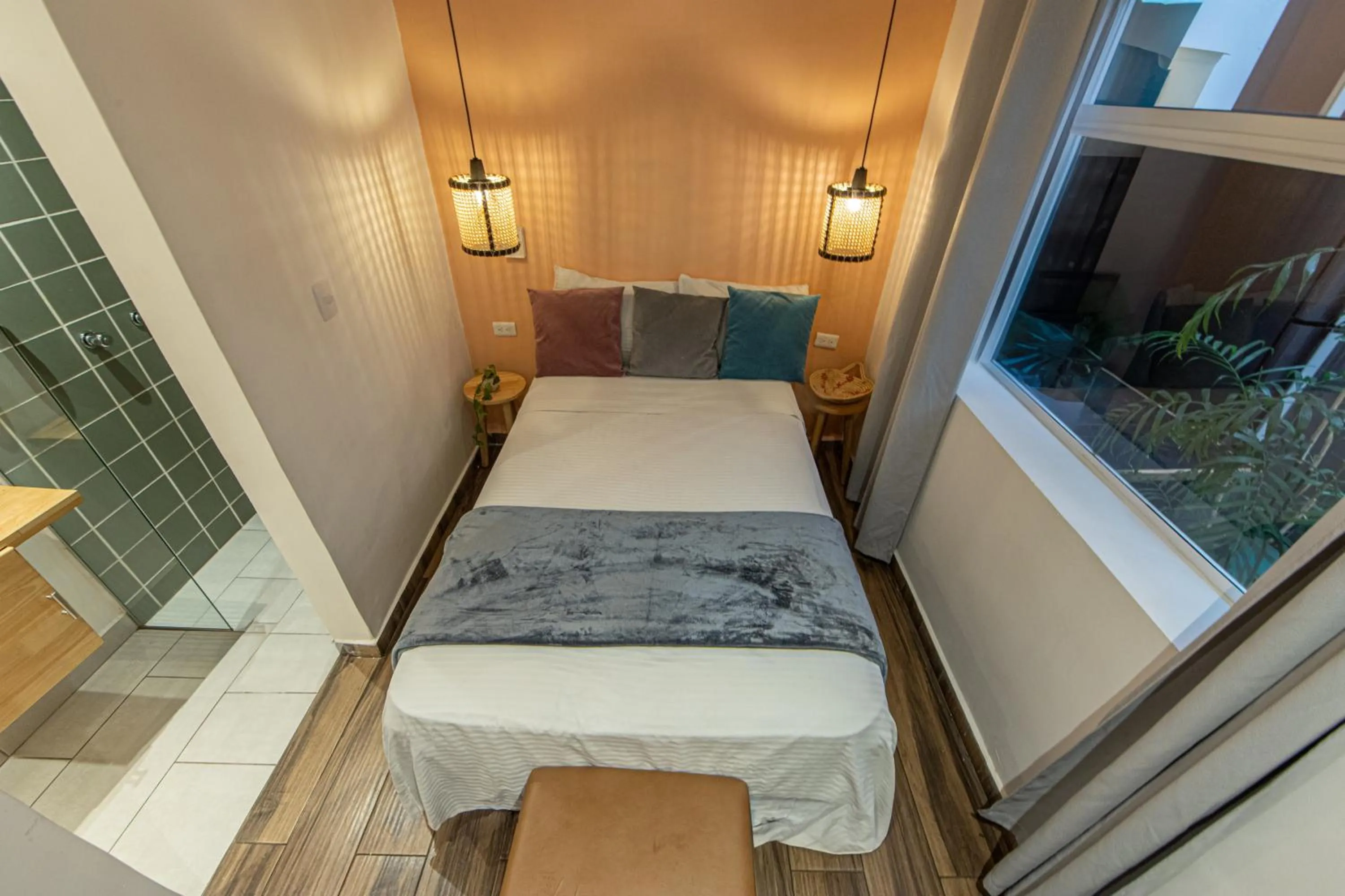 Bed in La Martina Boutique Hotel