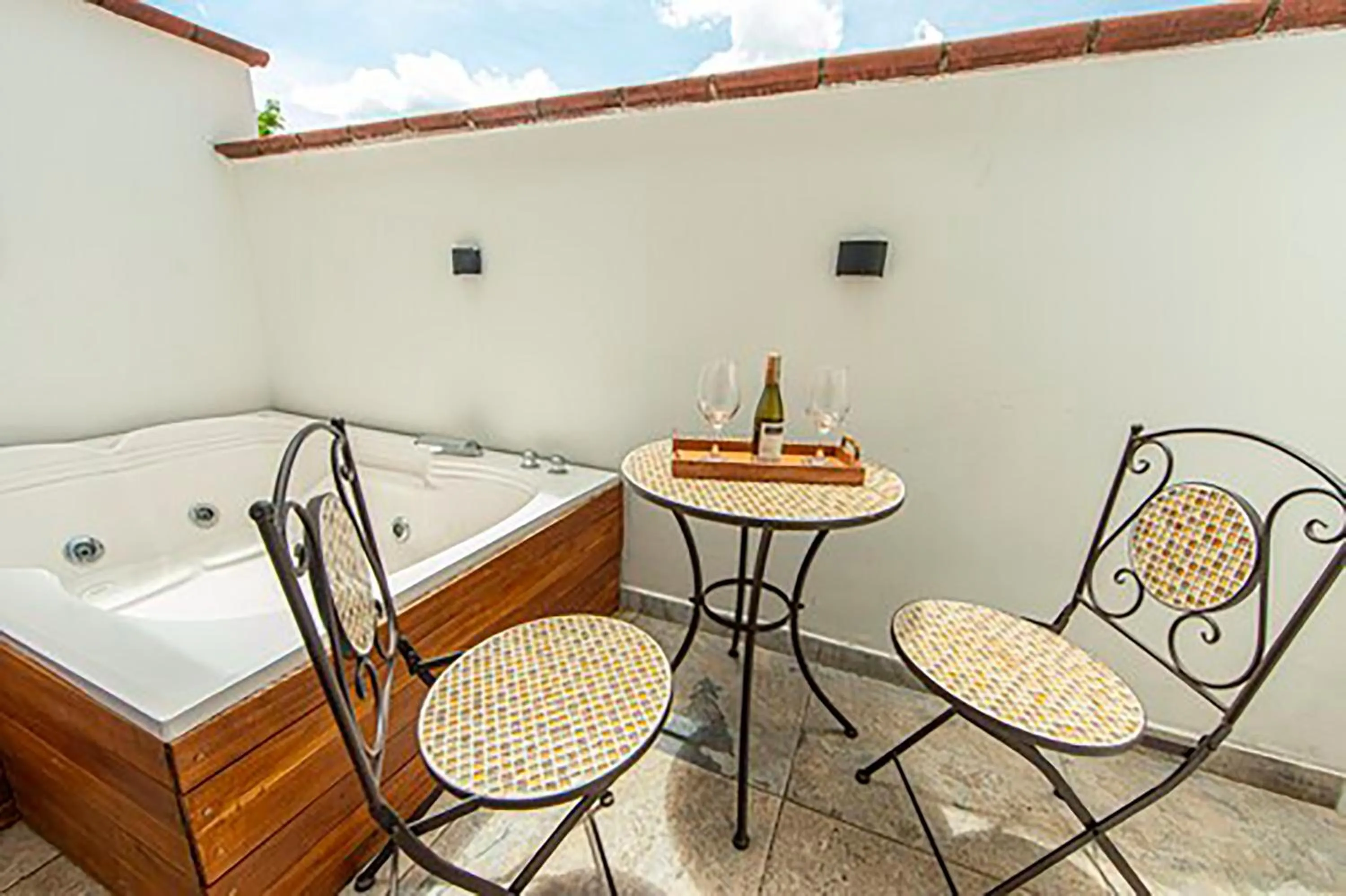 Patio, Bed in La Martina Boutique Hotel