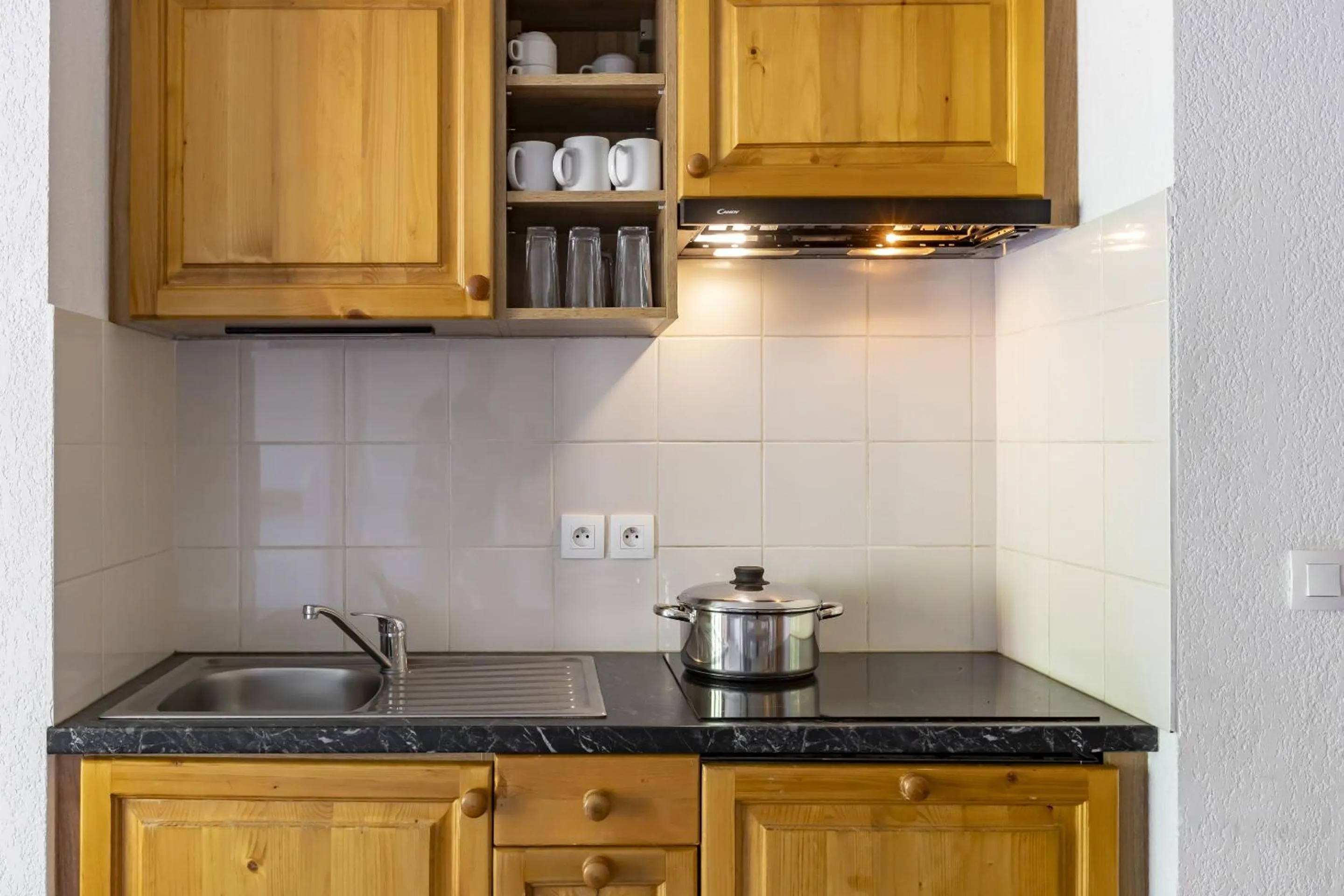 Kitchen or kitchenette in Résidence Odalys Les Bergers