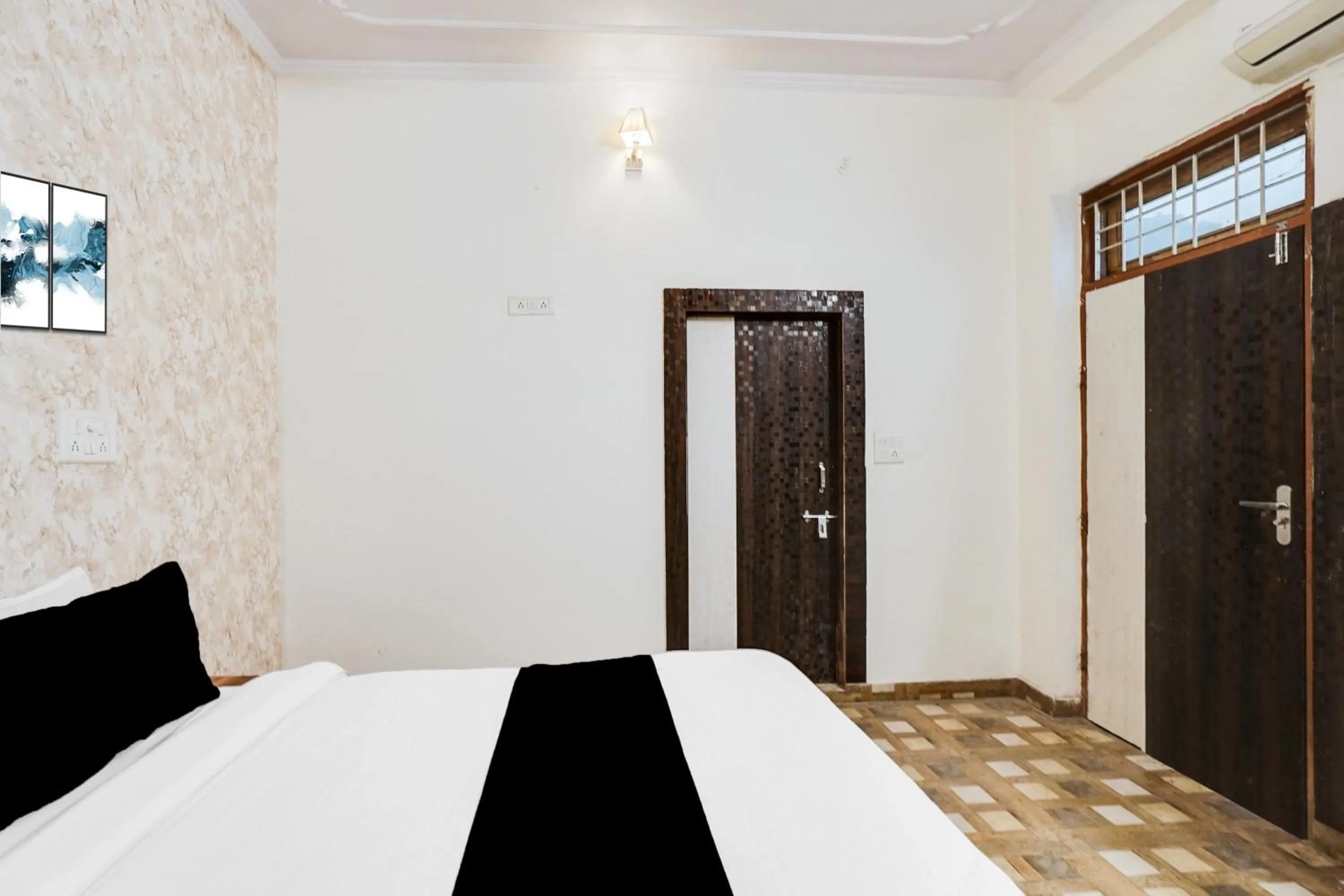Bedroom, Bed in Hotel O Radhaswami Nagar Formerly Chinnar
