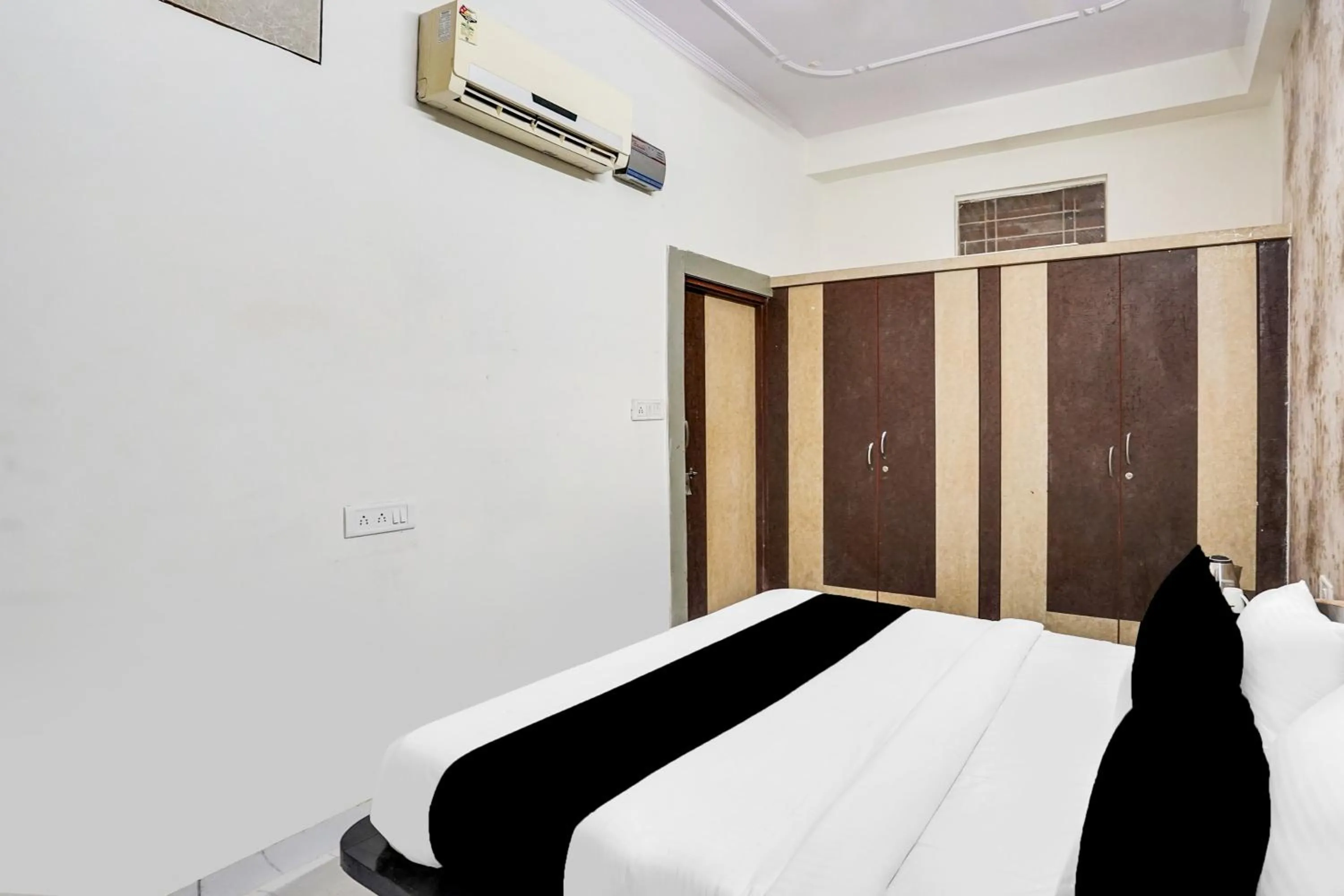 Bedroom, Bed in Hotel O Radhaswami Nagar Formerly Chinnar