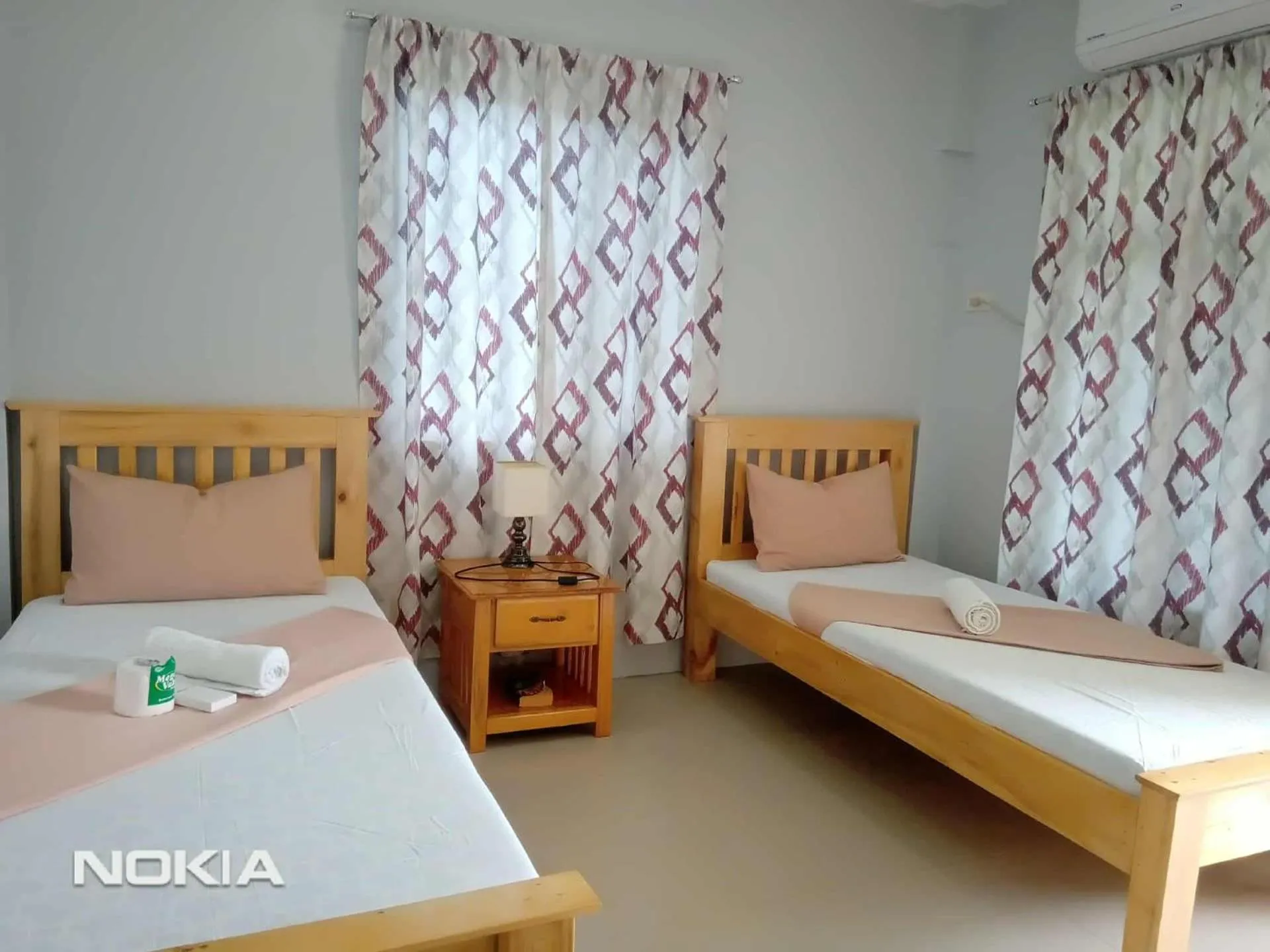 Bed in Grae’s Apartelle