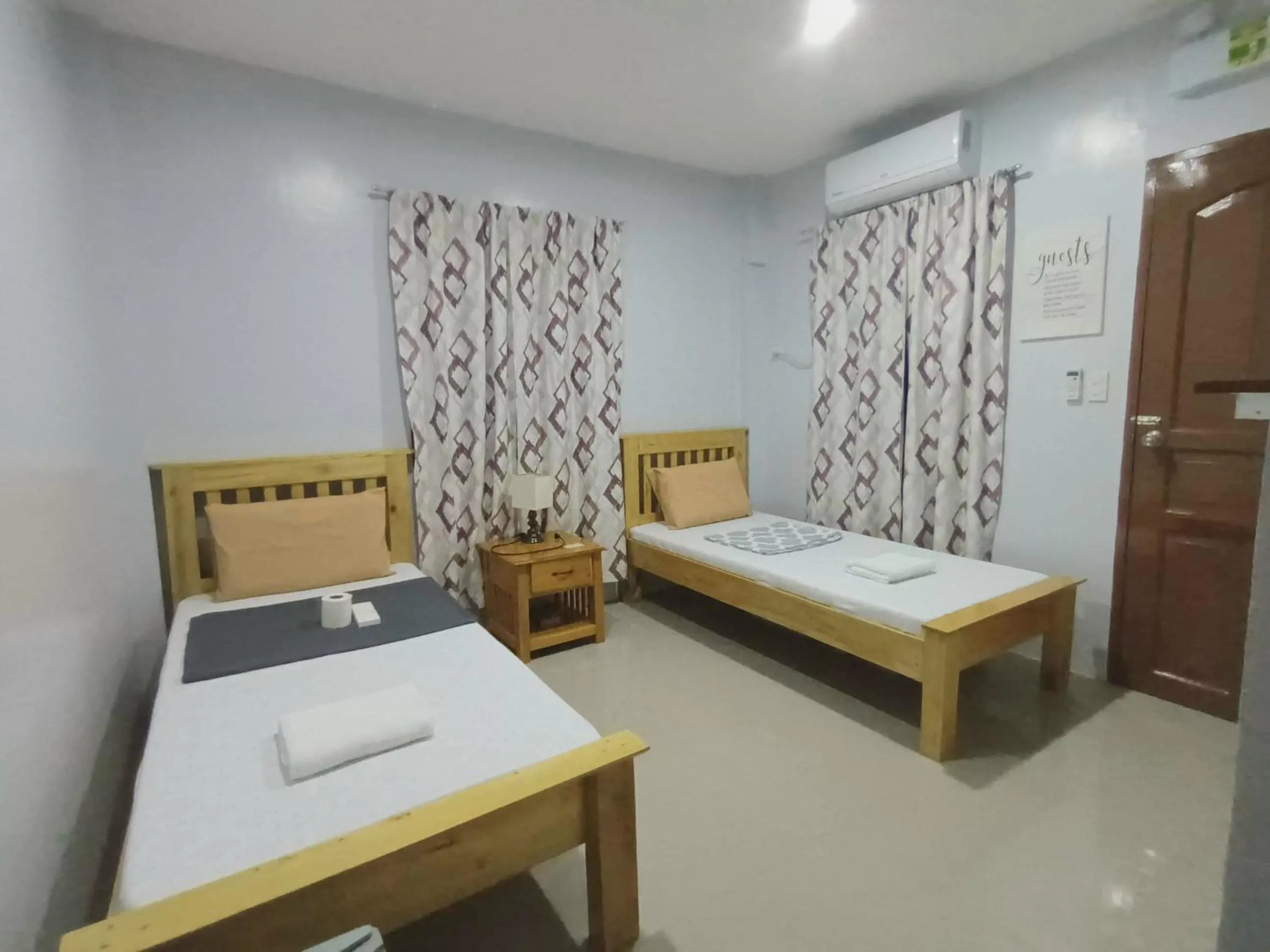 Bed in Grae’s Apartelle