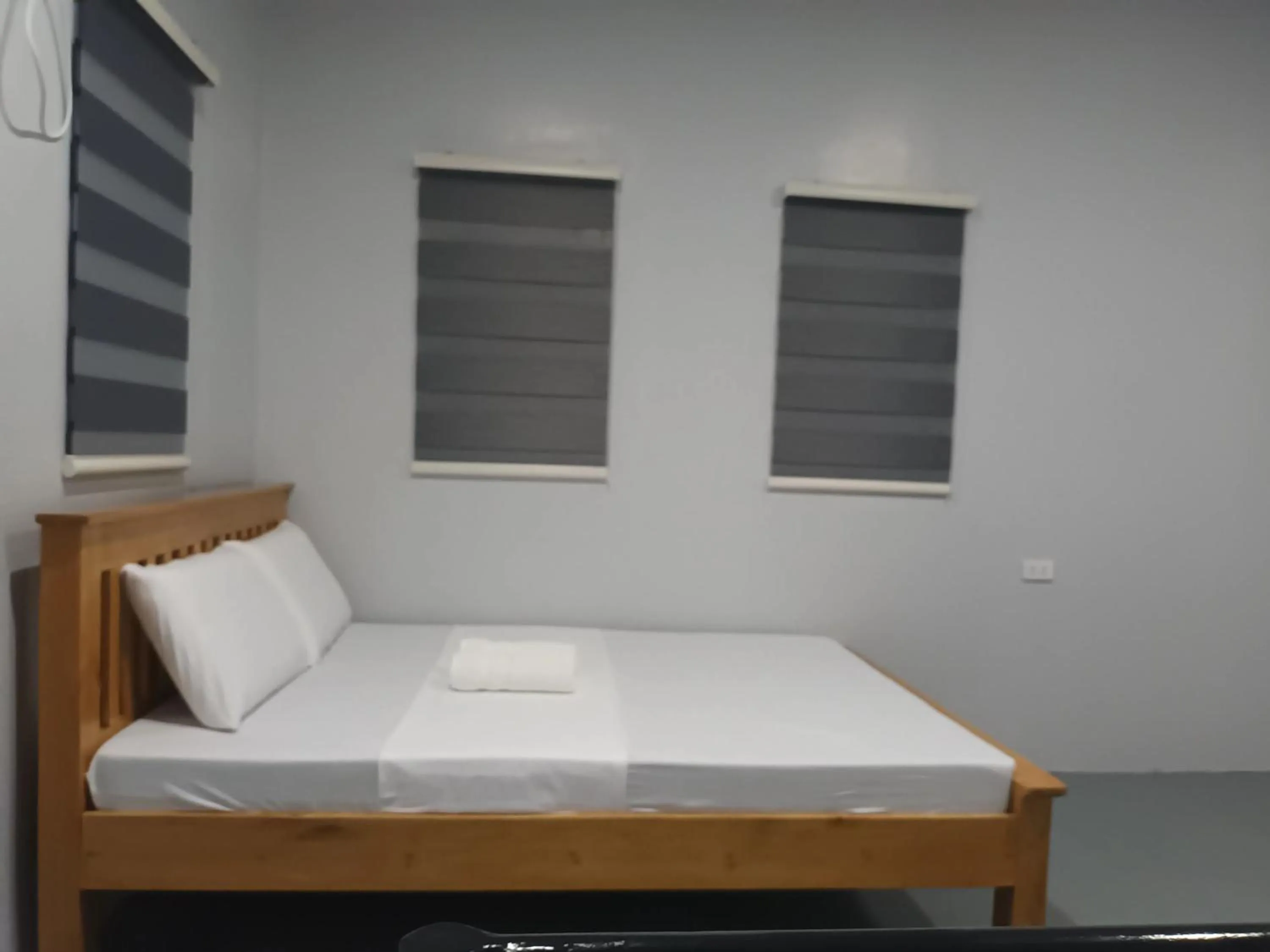 Bed in Grae’s Apartelle