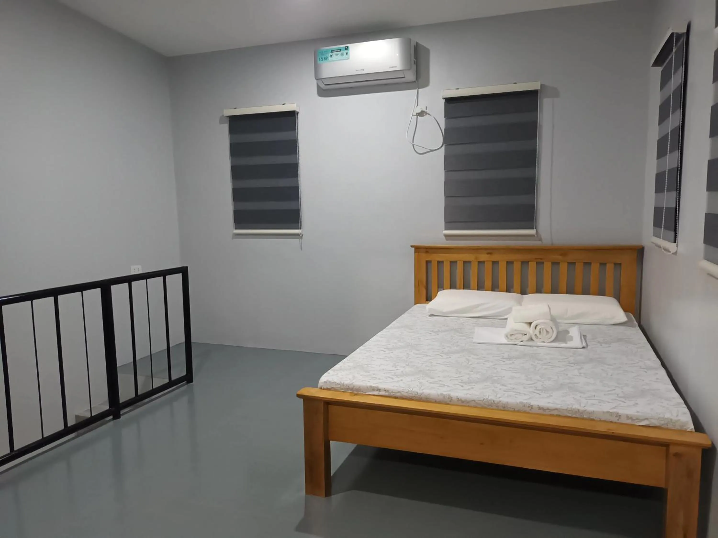 Bed in Grae’s Apartelle