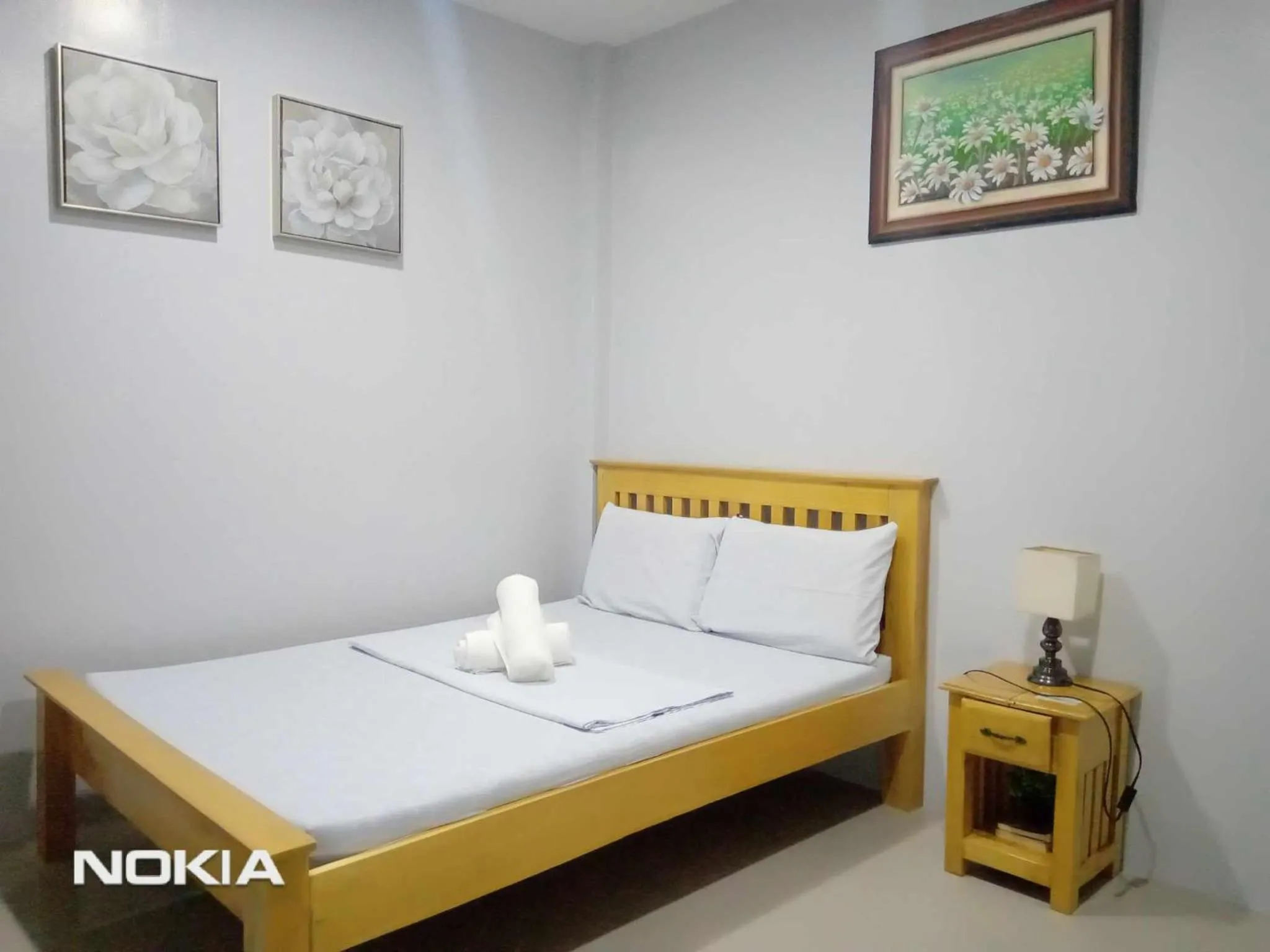 Bed in Grae’s Apartelle