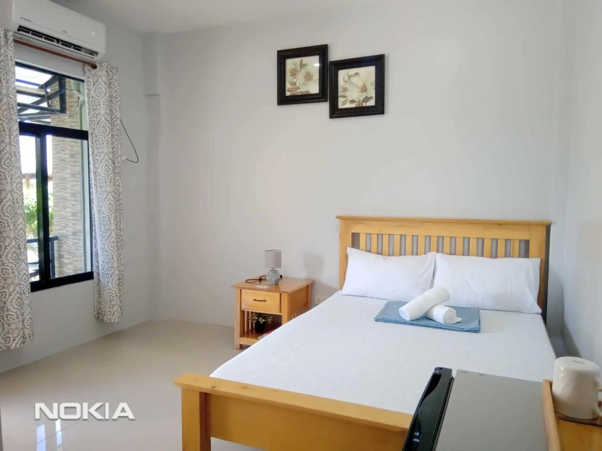 Bed in Grae’s Apartelle