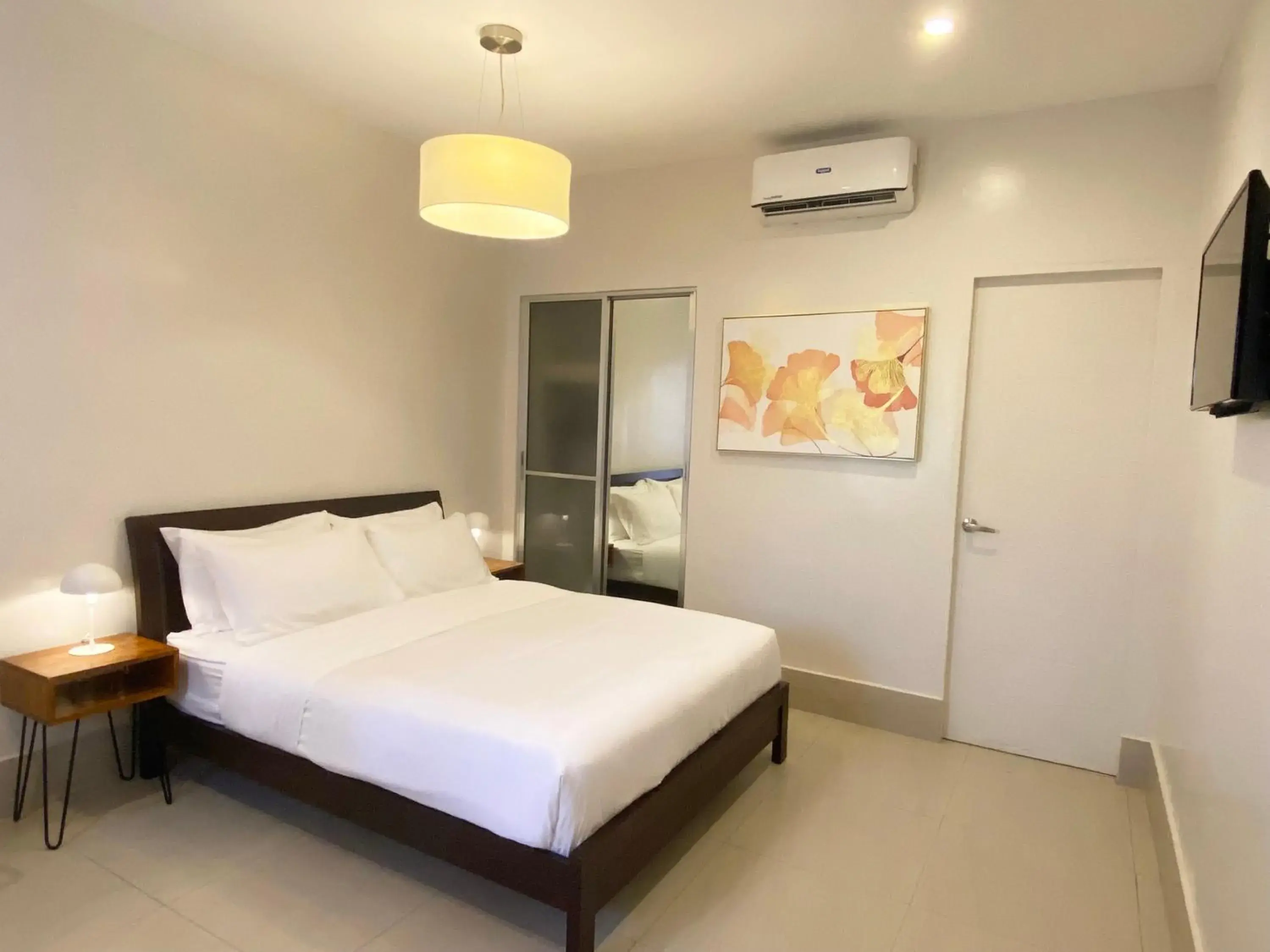Bed in HARMAN SUITES Moalboal Bed in HARMAN SUITES Moalboal