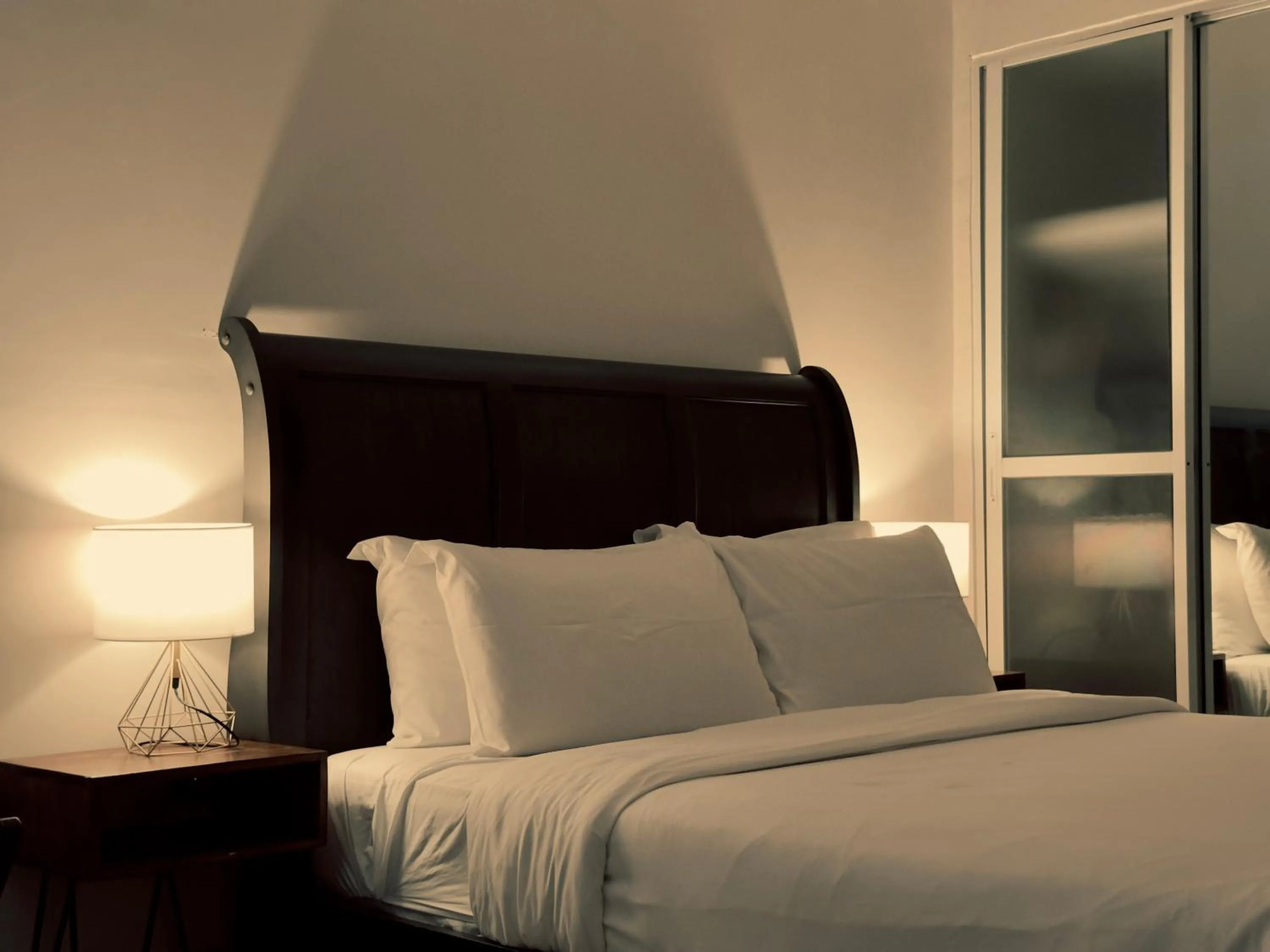 Bed in HARMAN SUITES Moalboal