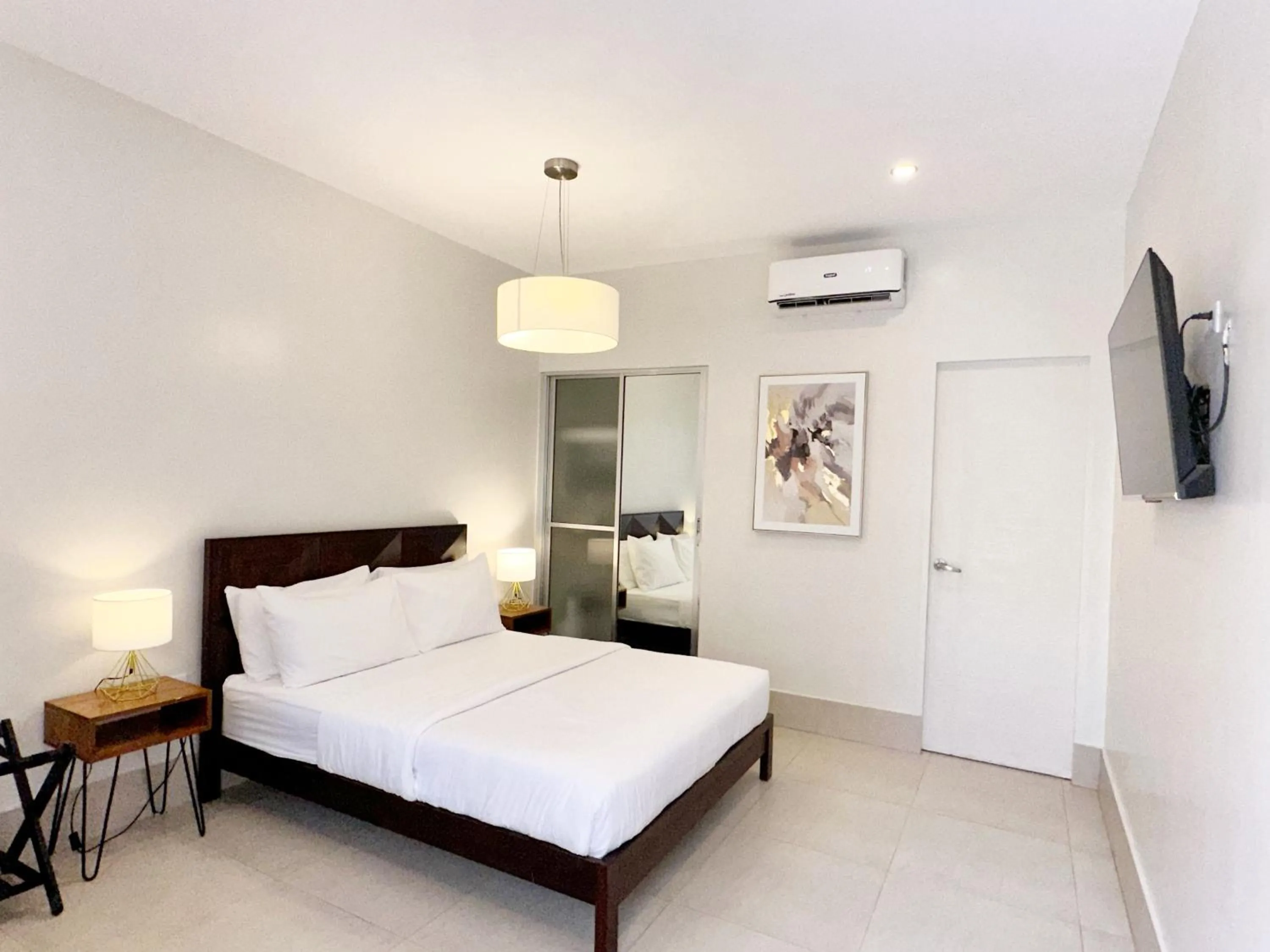 Bed in HARMAN SUITES Moalboal