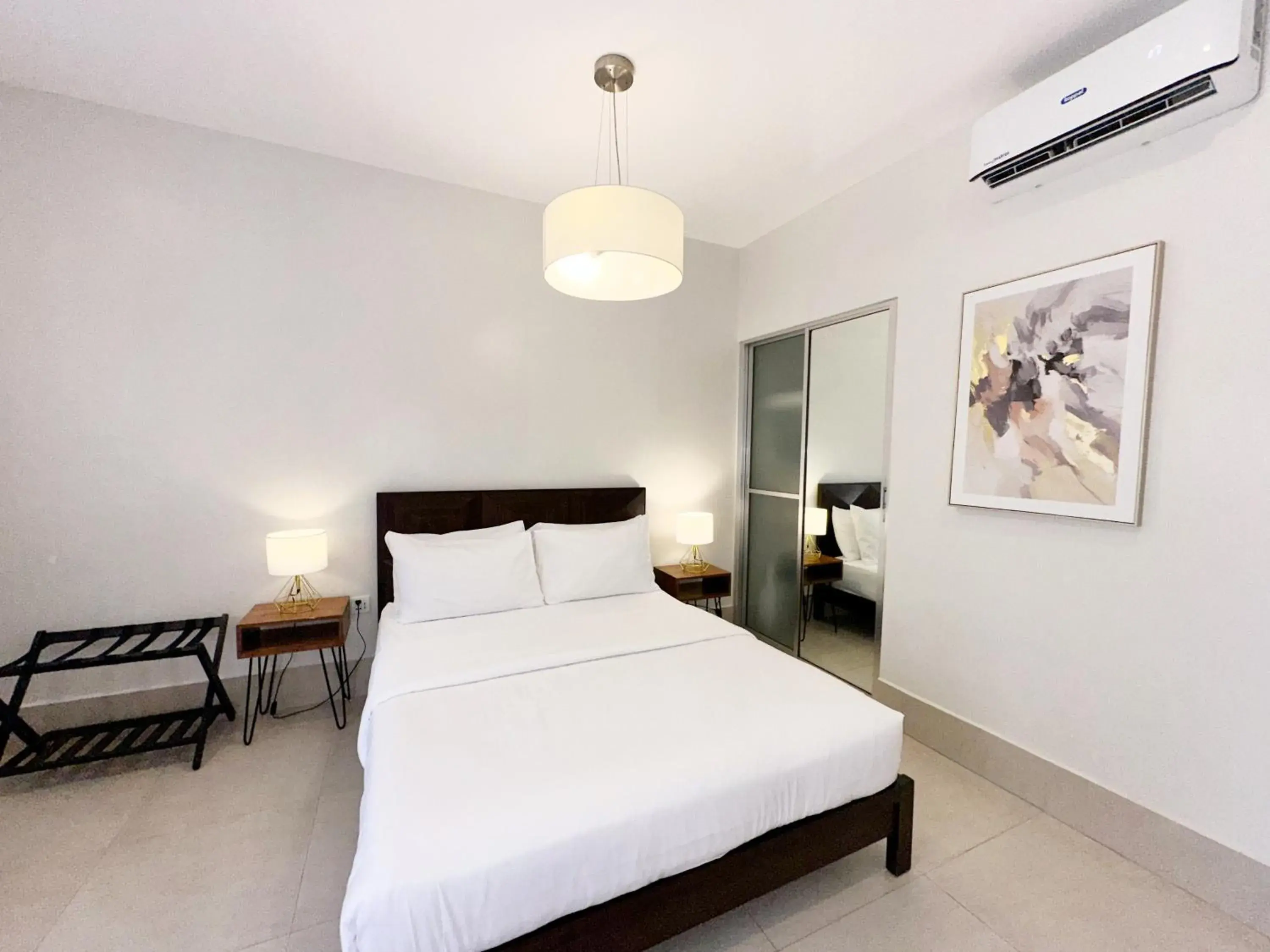 Bed in HARMAN SUITES Moalboal Bed in HARMAN SUITES Moalboal