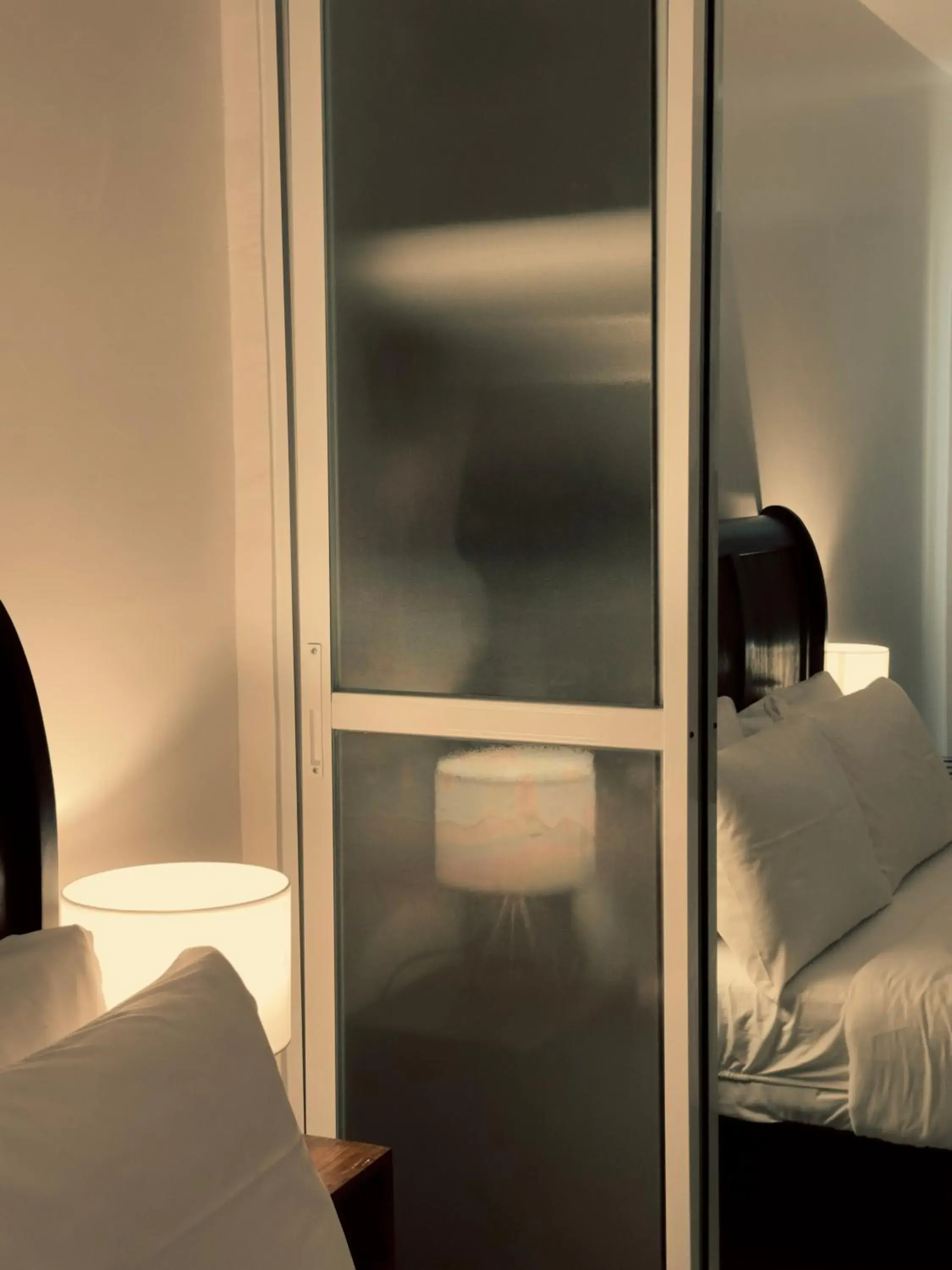 Bed in HARMAN SUITES Moalboal Bed in HARMAN SUITES Moalboal