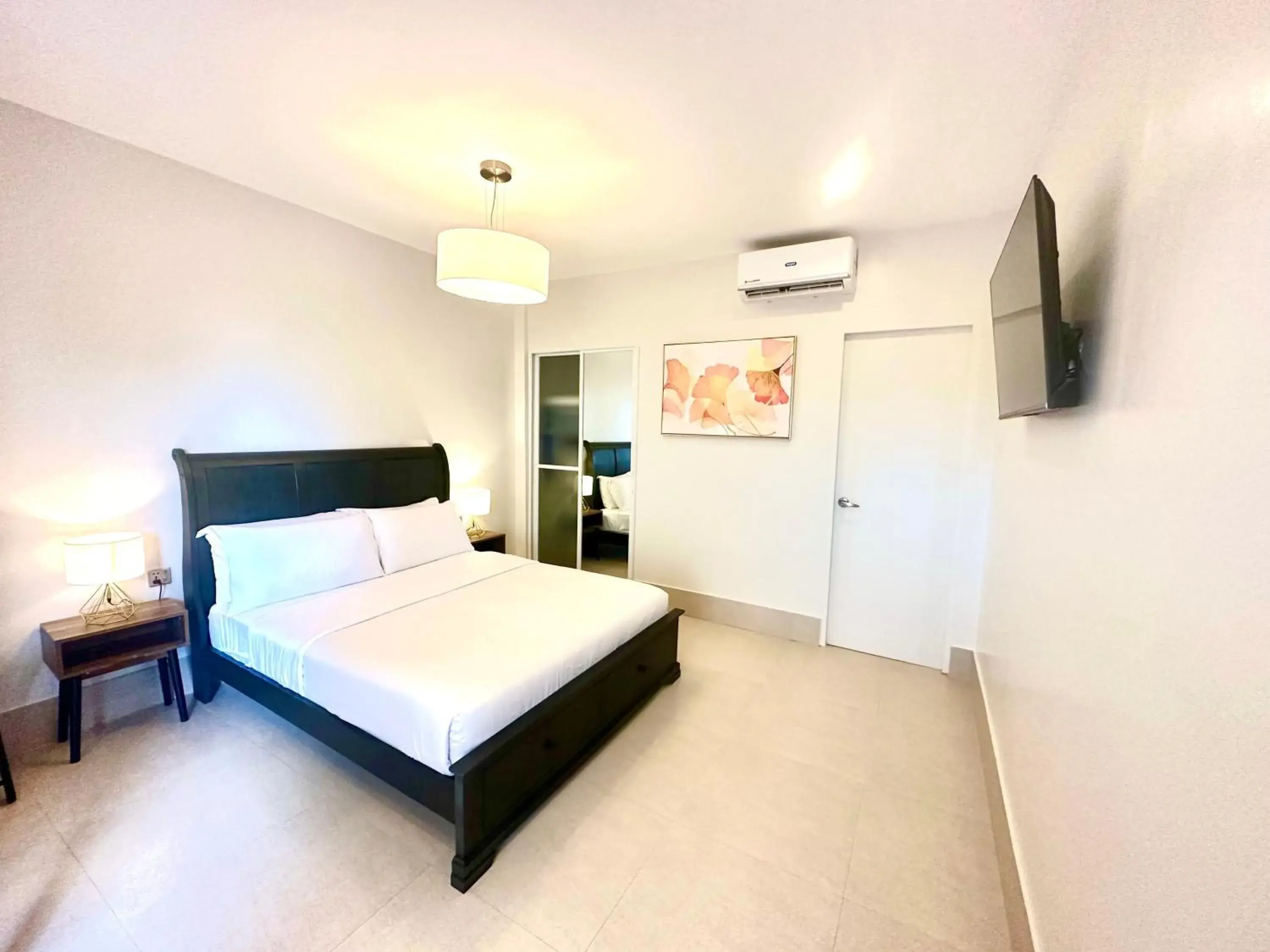 Bed in HARMAN SUITES Moalboal Bed in HARMAN SUITES Moalboal