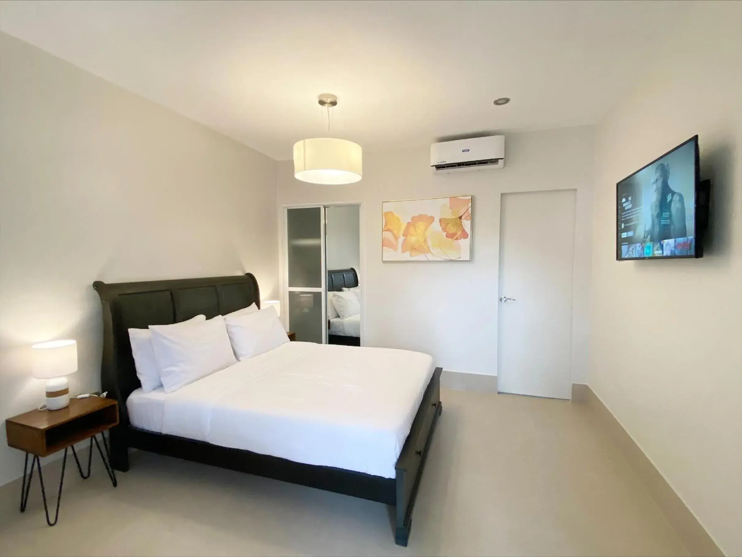 Bed in HARMAN SUITES Moalboal Bed in HARMAN SUITES Moalboal