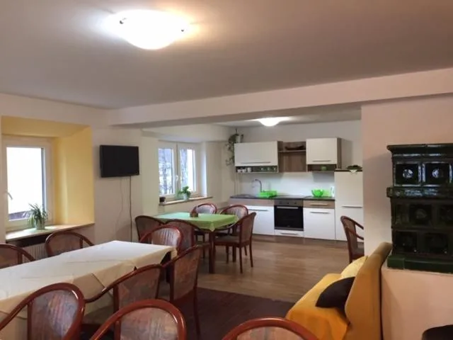 Communal lounge/ TV room in Youth Hostel Nika