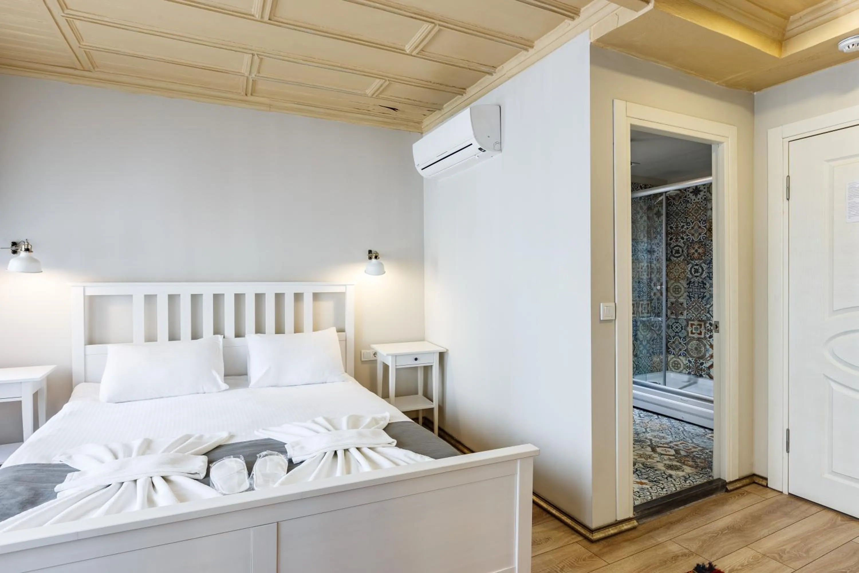 Bed in Hotel Miro Mansion Old City