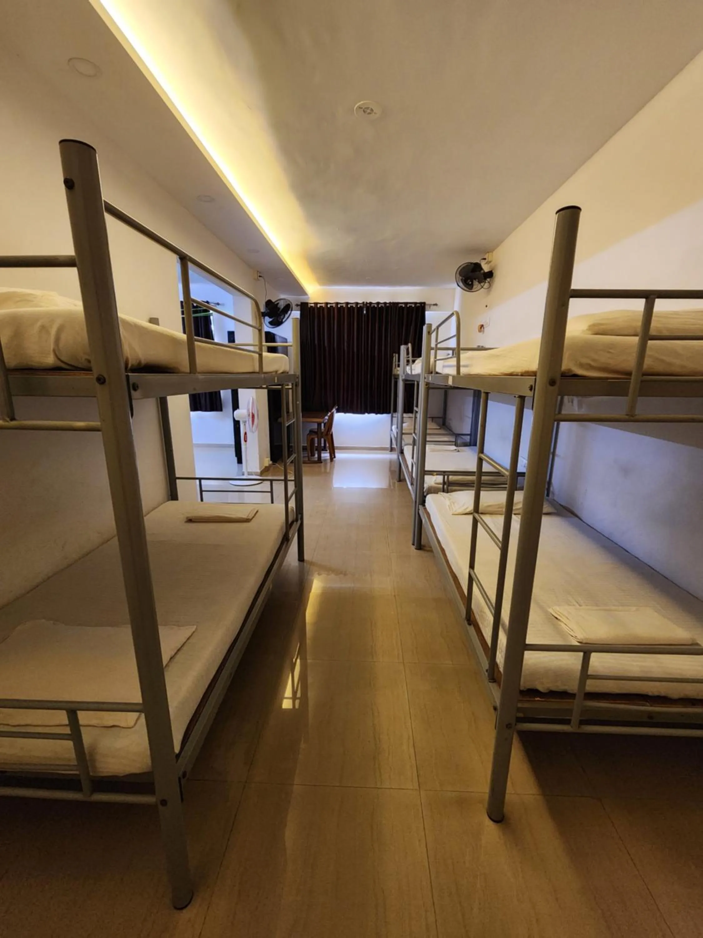 Bed in All Seasons Guest House I Rooms & Dorms