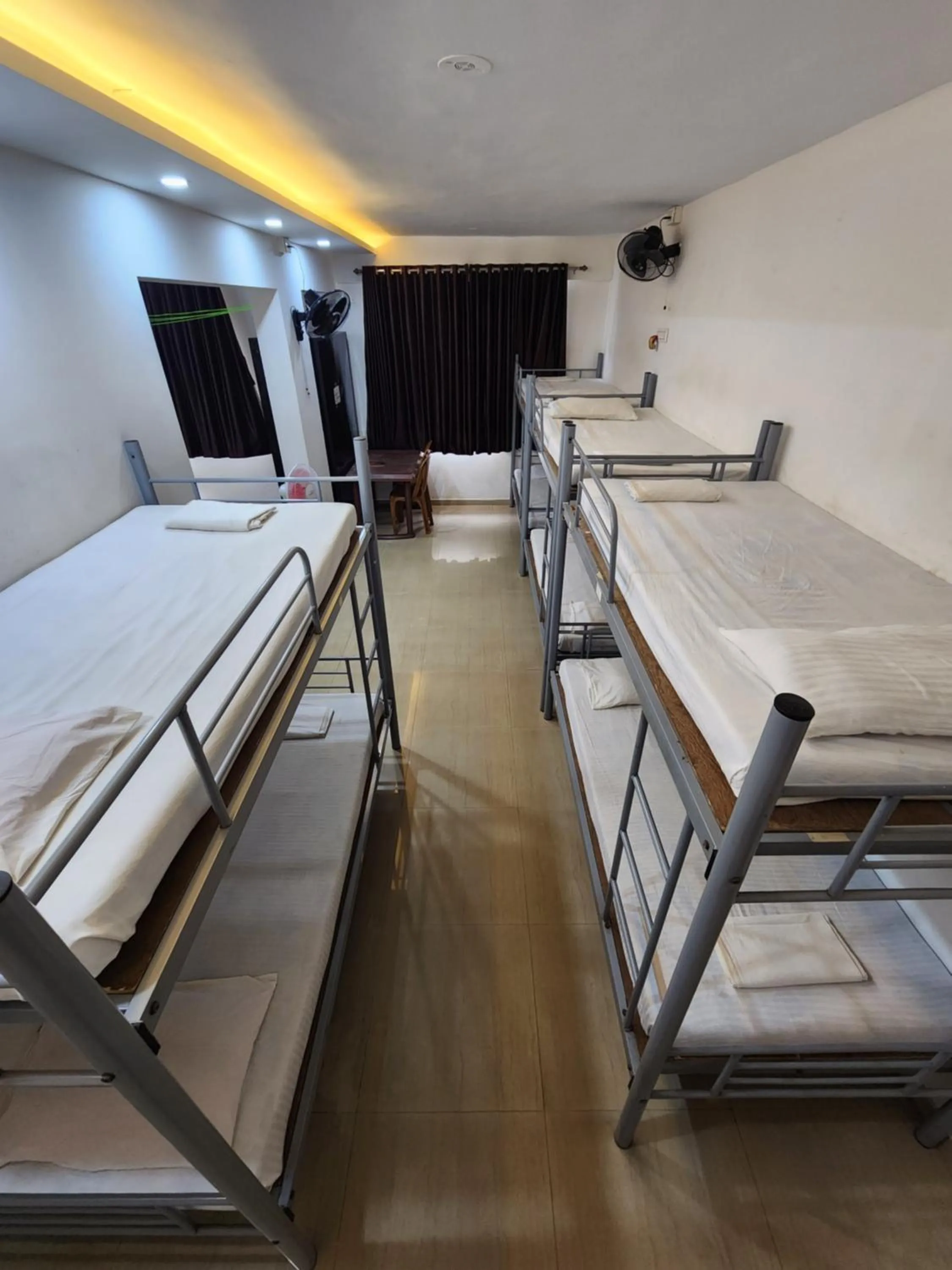 Bed in All Seasons Guest House I Rooms & Dorms