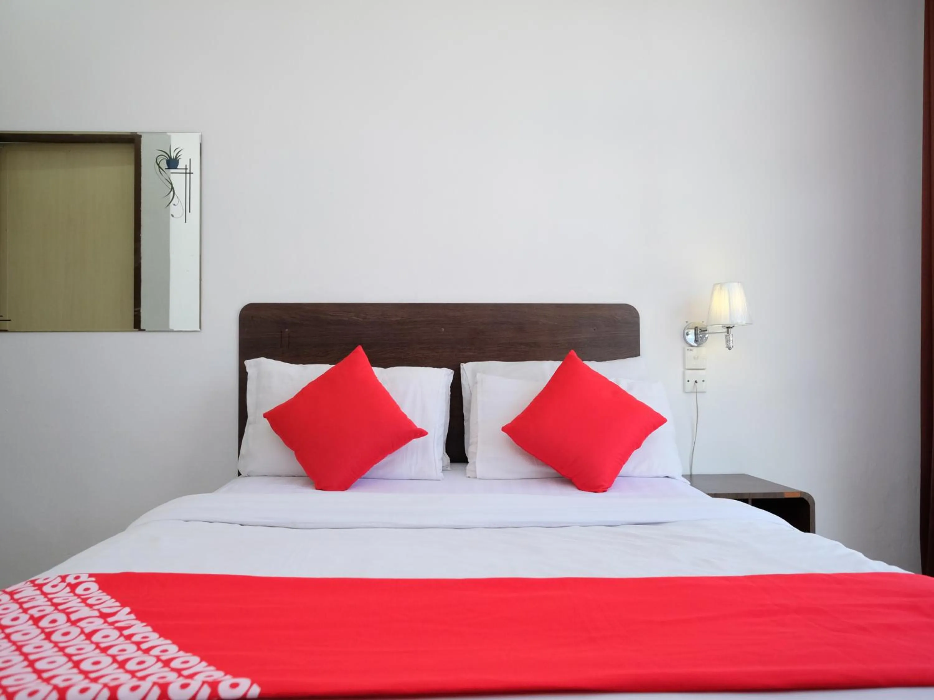 Bedroom in OYO 619 Grand City Hotel 2