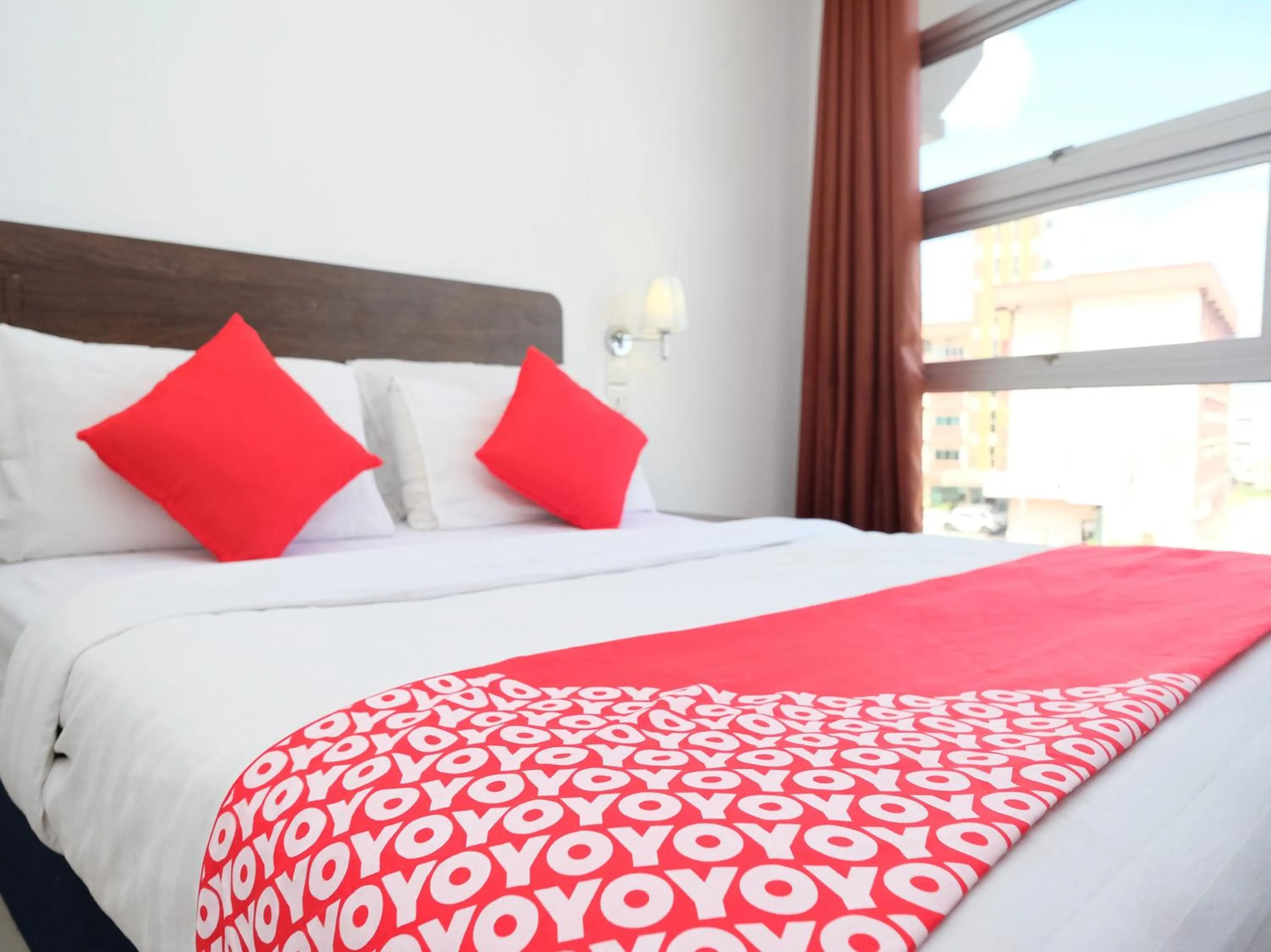 Bedroom in OYO 619 Grand City Hotel 2