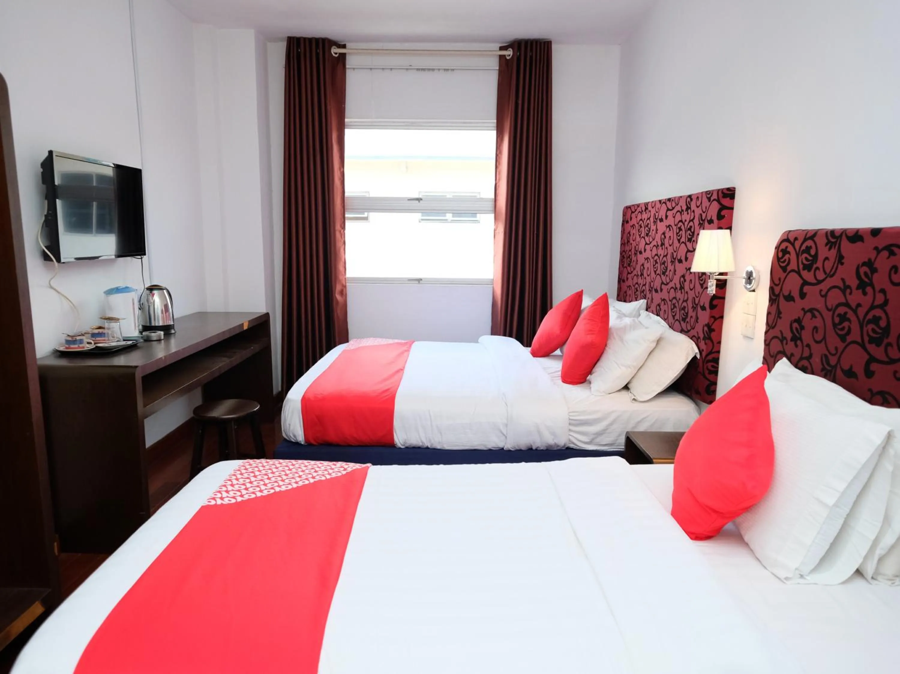 Bedroom in OYO 619 Grand City Hotel 2