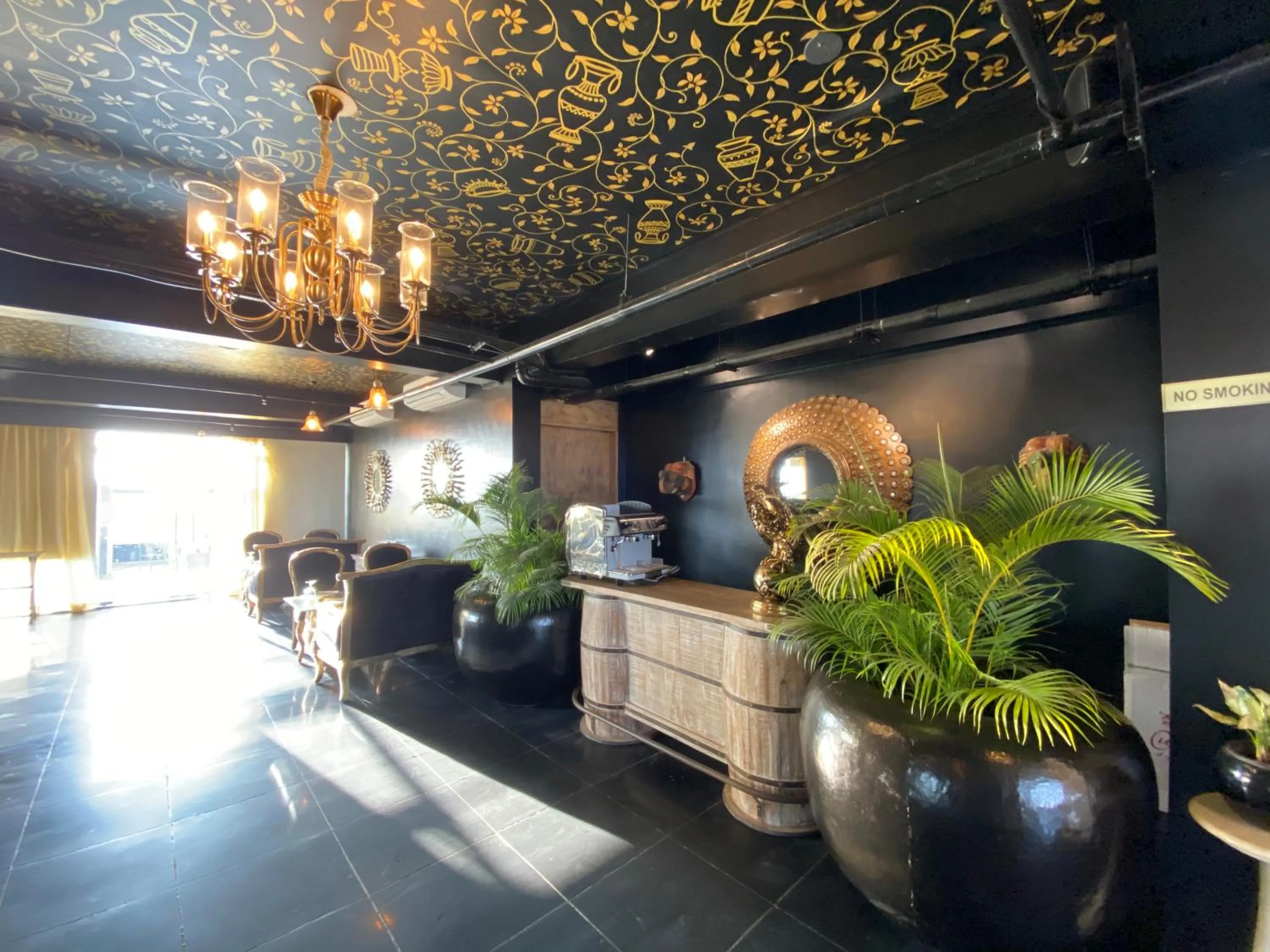 Lounge or bar in The Ramvilas - A Rooftop Pichola Lake View Hotel