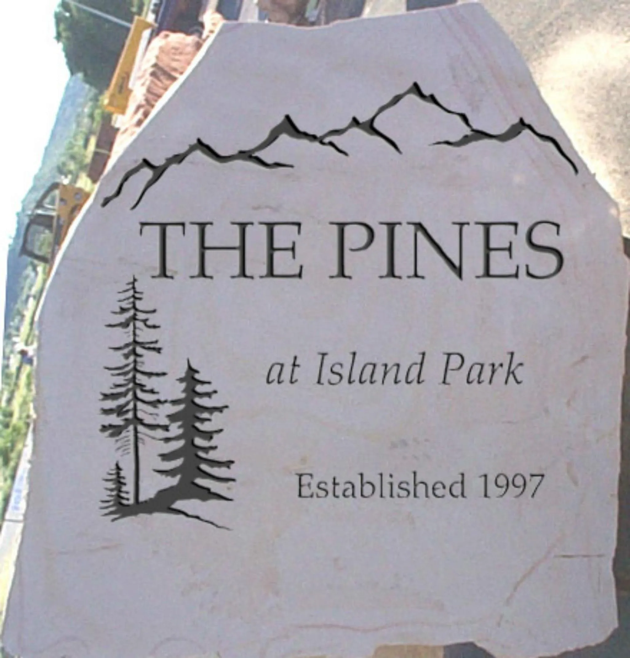 Property logo or sign in The Pines at Island Park