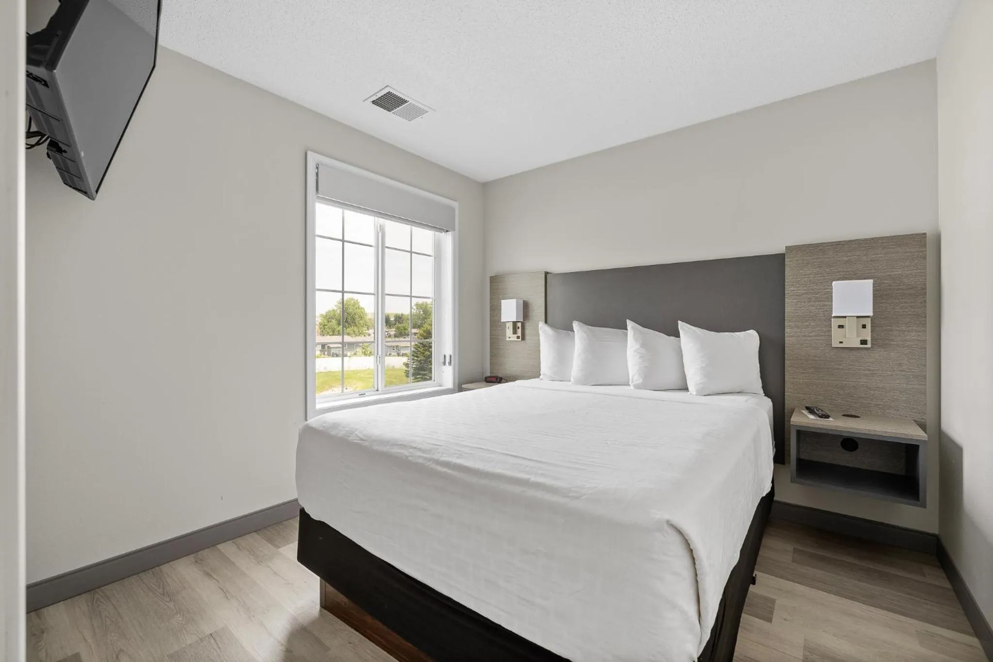 Bed in GrandStay Residential Suites Rapid City
