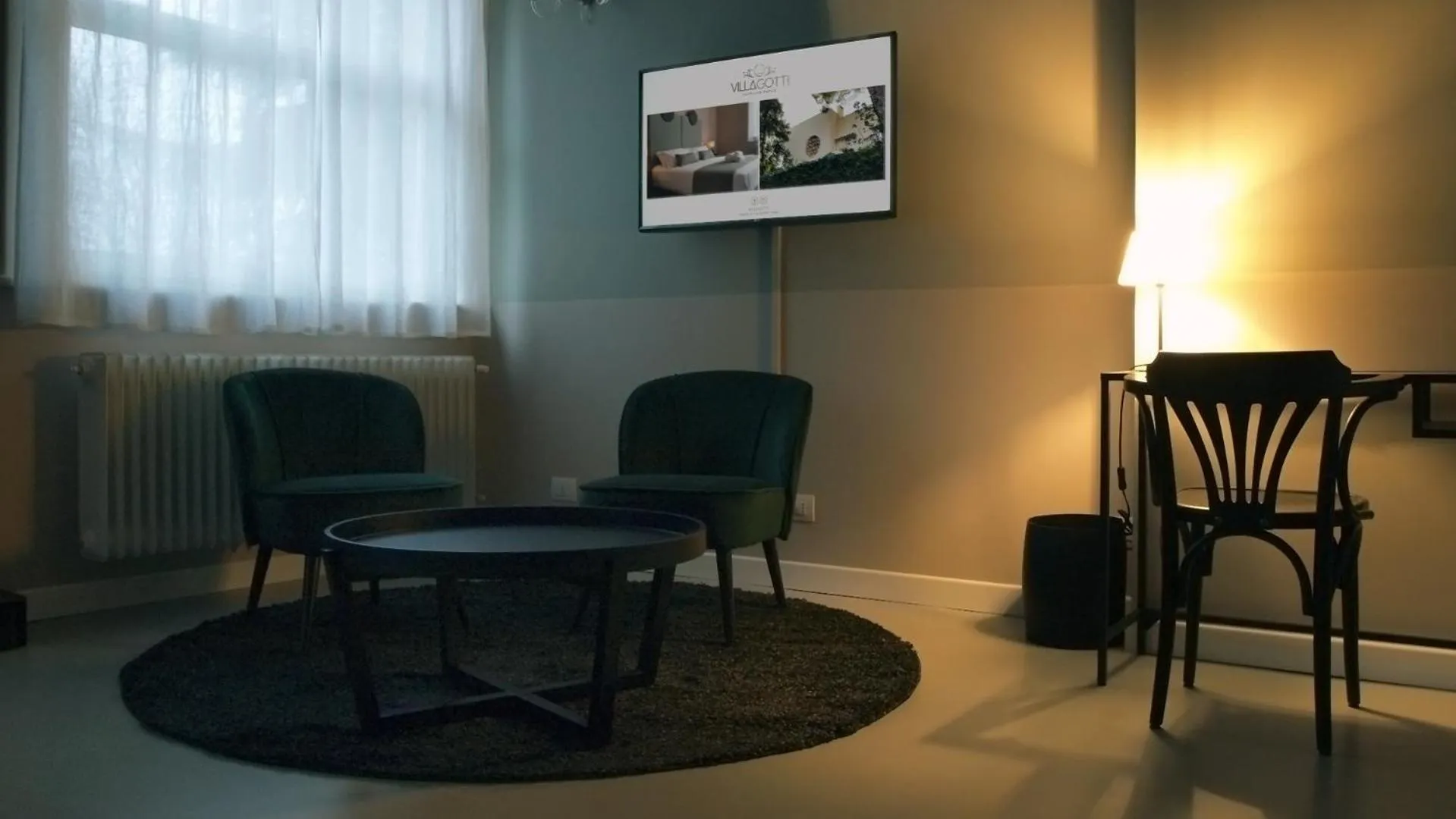 TV and multimedia in Villa Gotti Charming Rooms