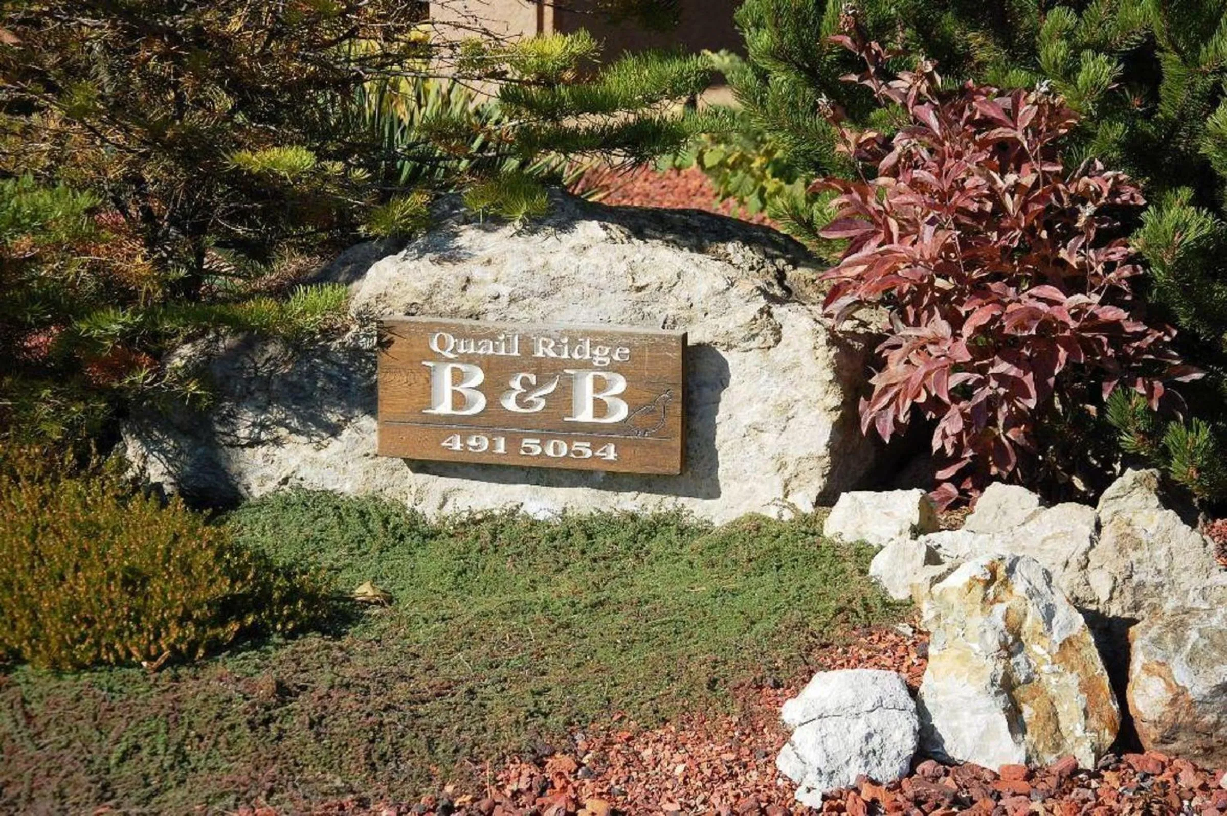 Property logo or sign in A Vacation Paradise at Quail Ridge B&B