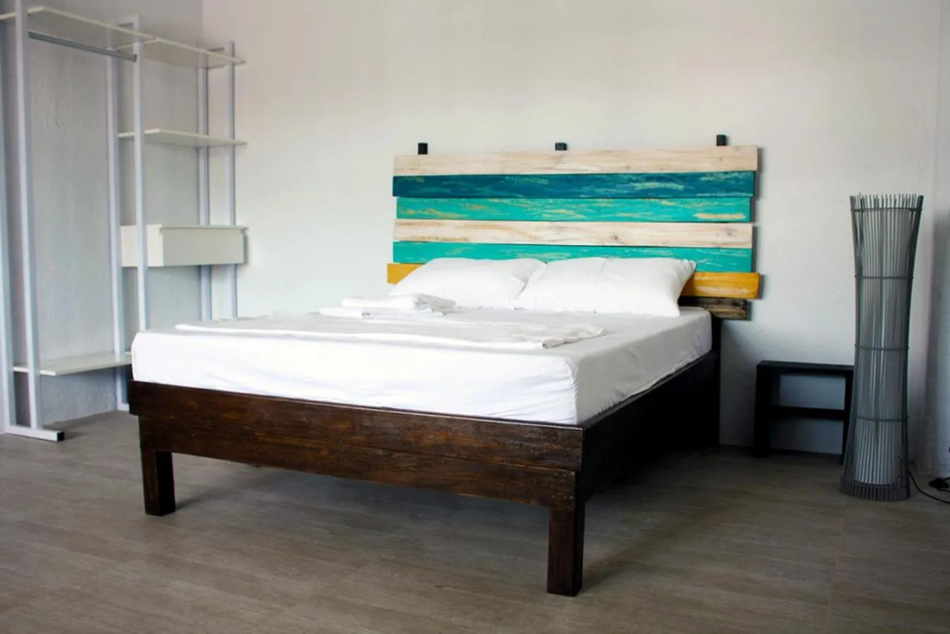 Bed in Sentro Suites Siargao