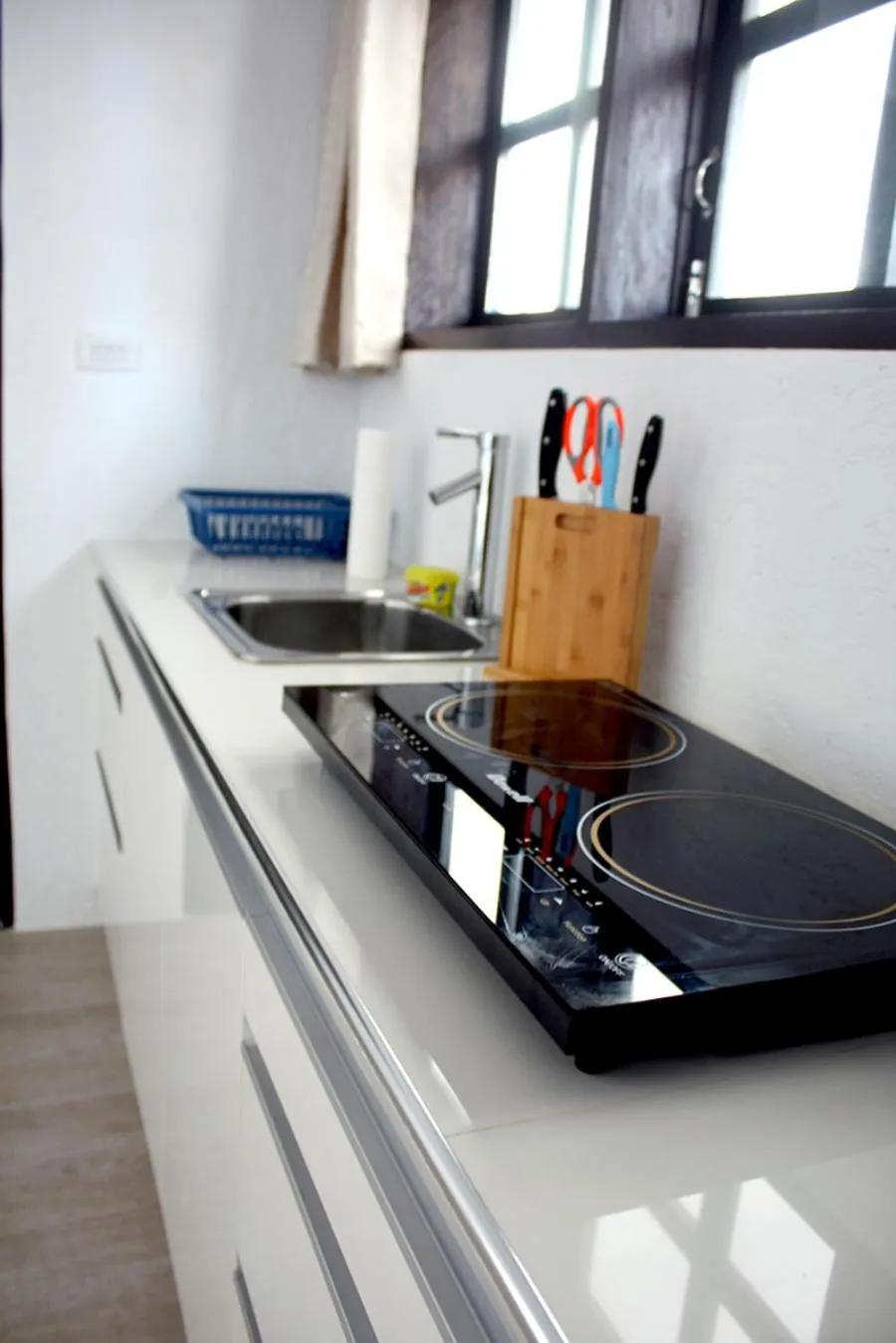 Kitchen or kitchenette in Sentro Suites Siargao