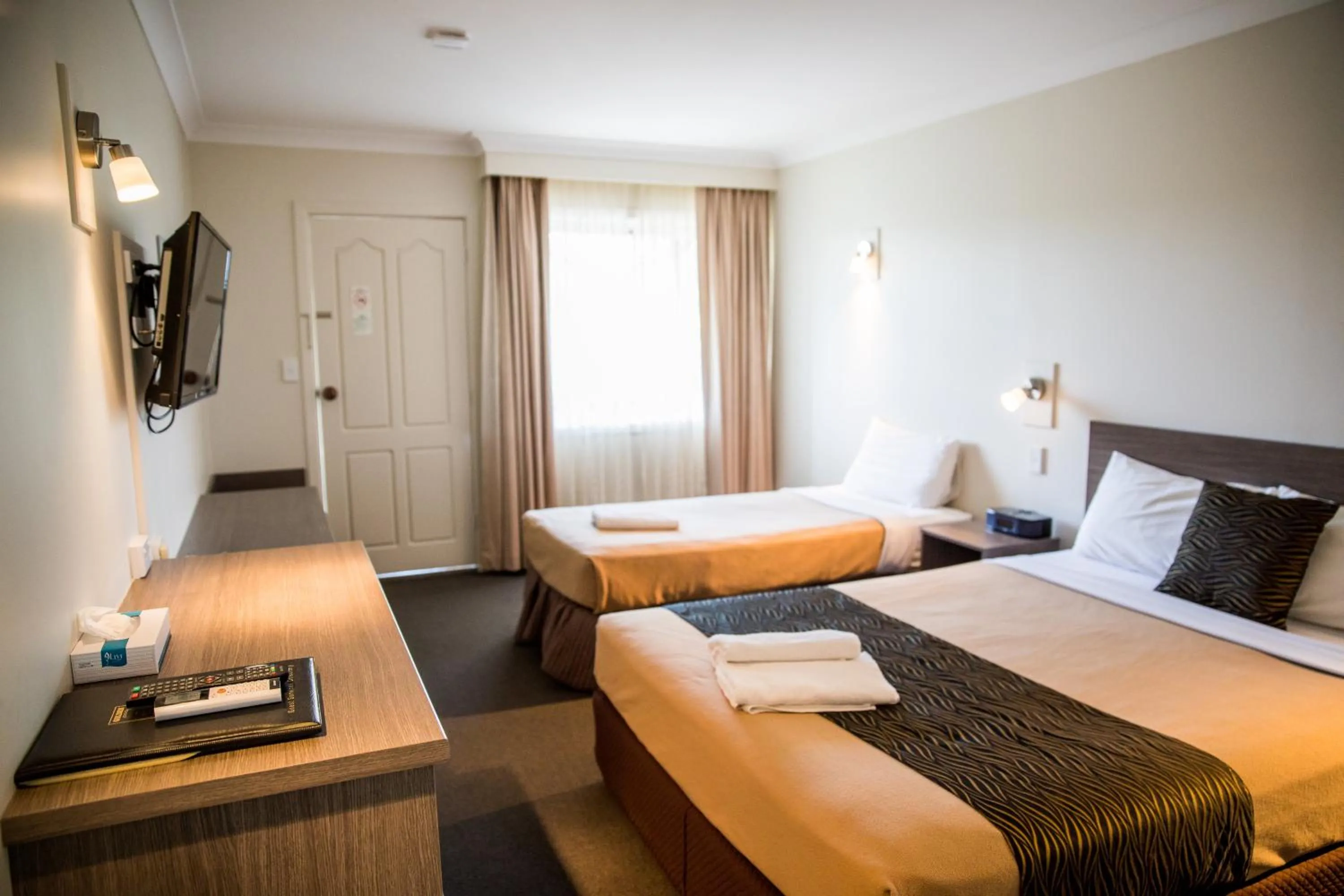 Bed in Lilac City Motor Inn