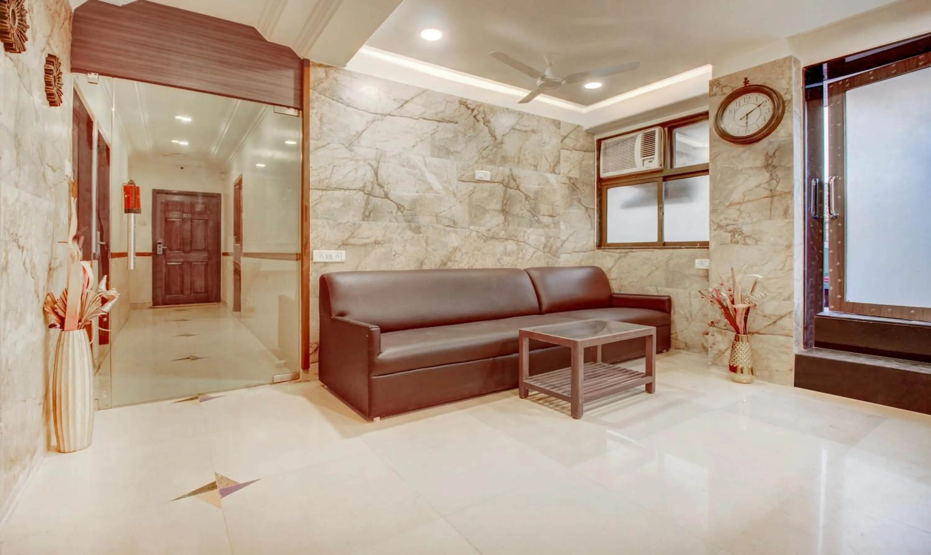 Seating area in Treebo Cruz Royale Santacruz West