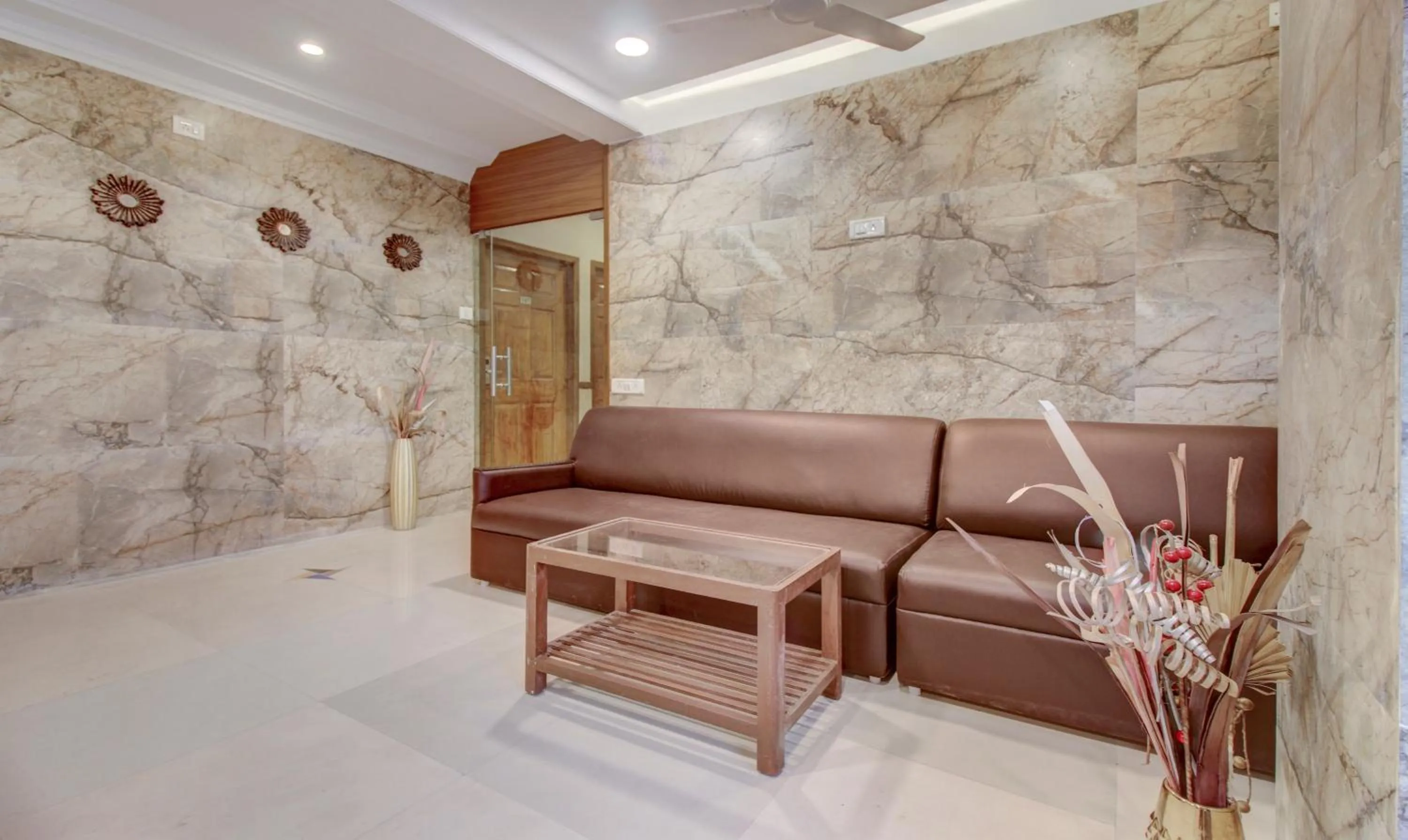 Seating area in Treebo Cruz Royale Santacruz West