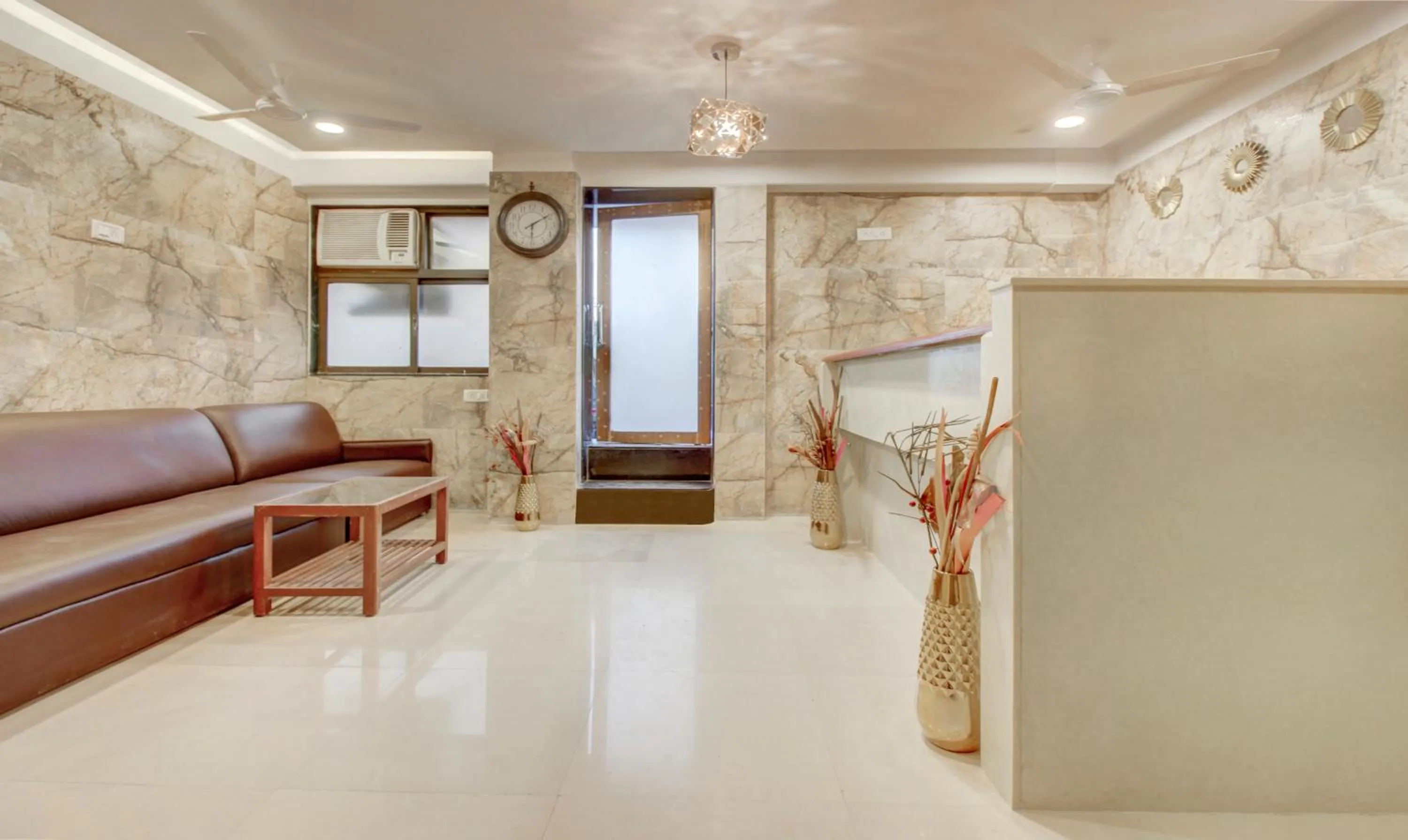 Seating area in Treebo Cruz Royale Santacruz West