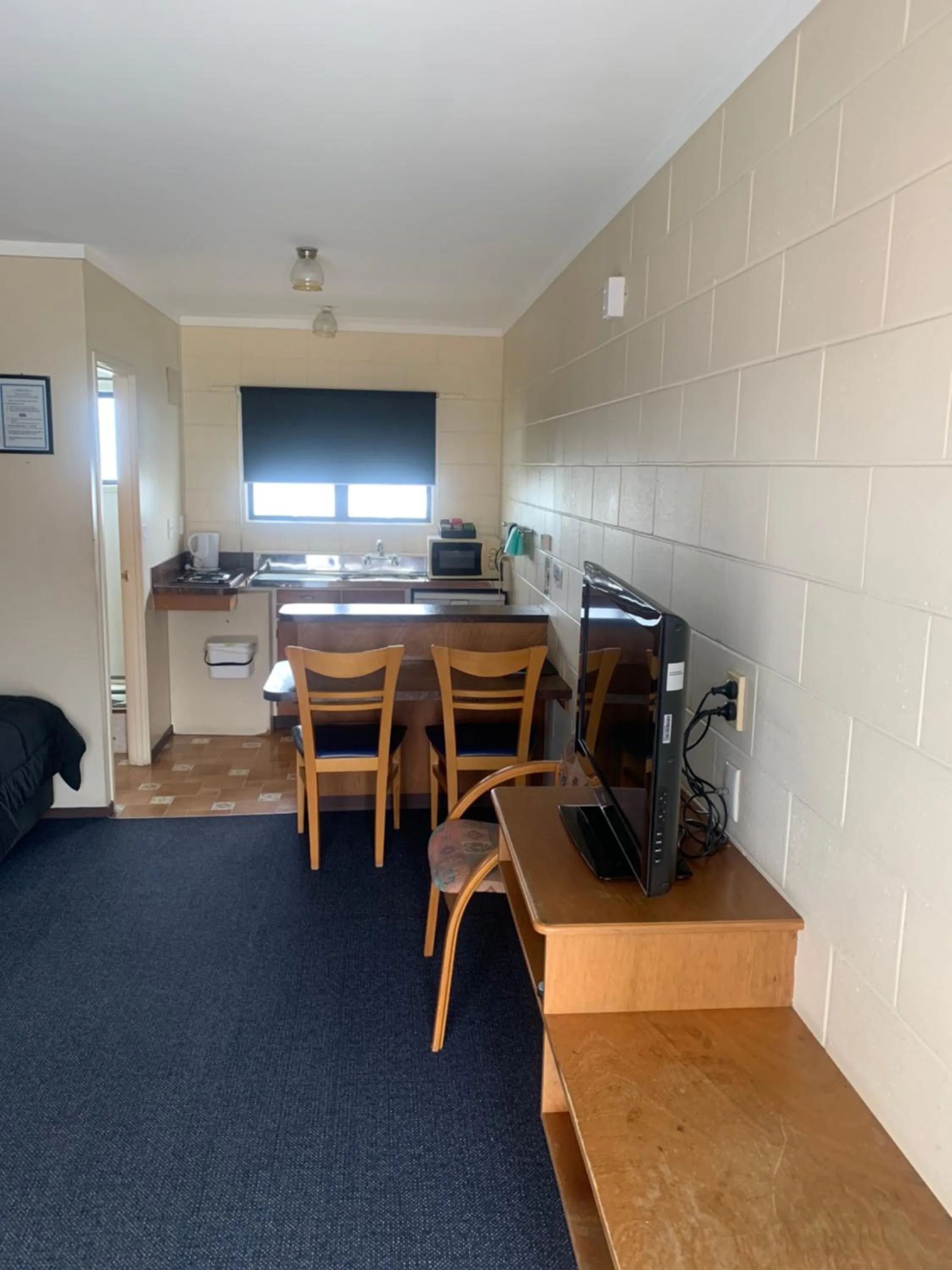 Bed in Wayfarer Motel