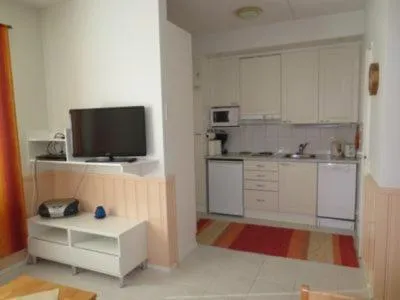 Kitchen or kitchenette in Aparthotel YlläStar