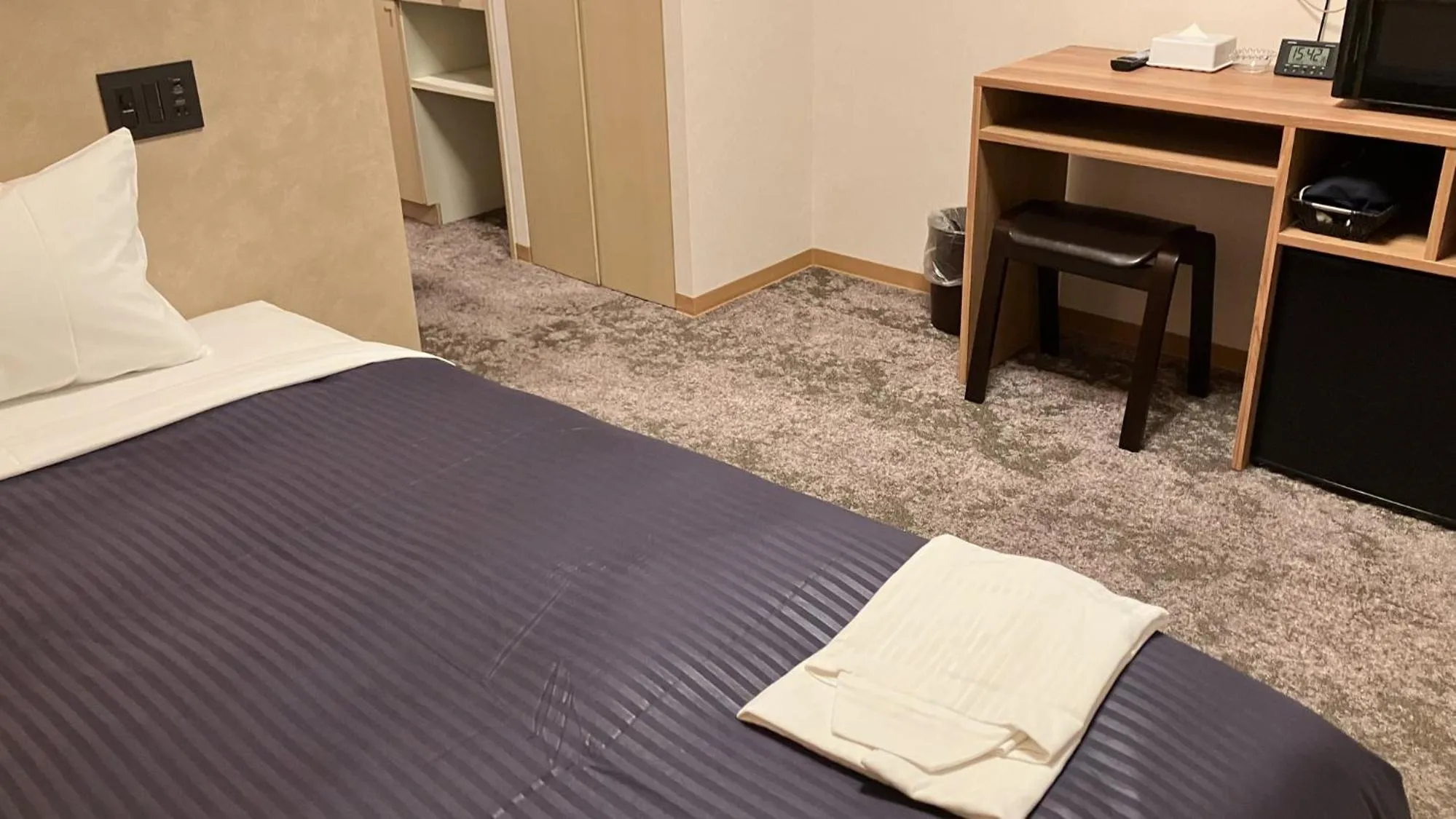 Bed in HOTEL LiVEMAX BUDGET Shinbashi