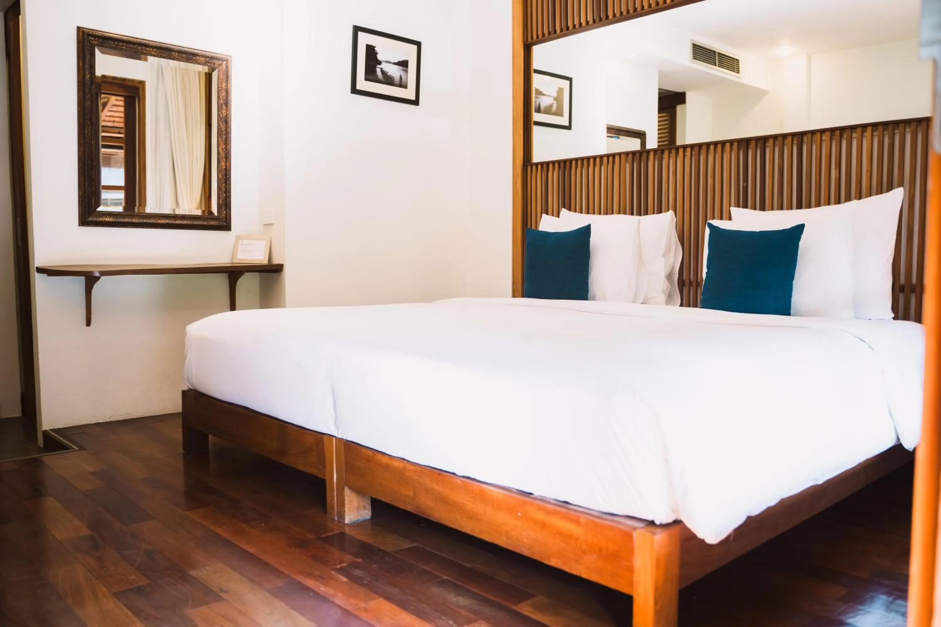 Bed in Le Sen Boutique Hotel